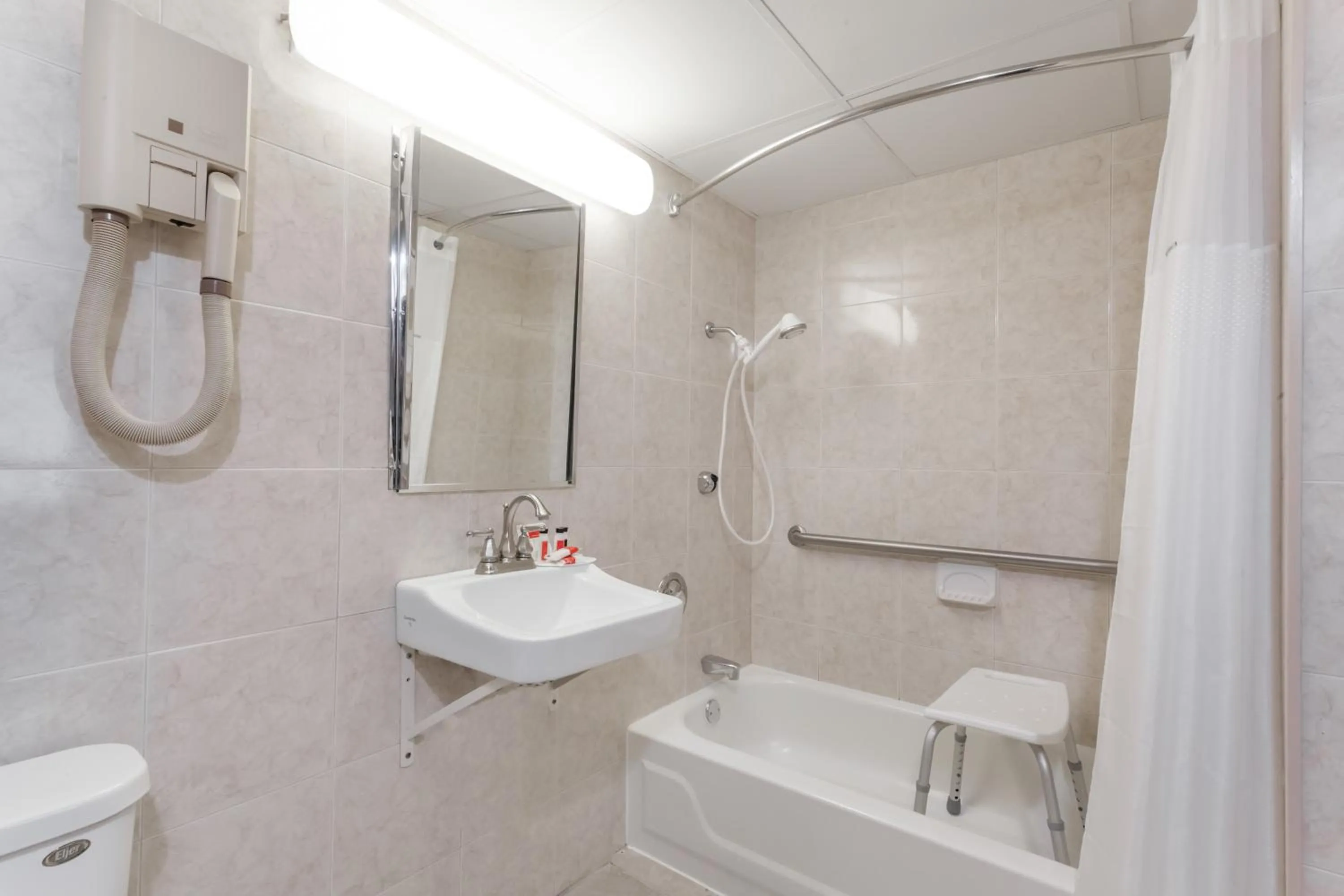 Bathroom in Ramada by Wyndham Newburgh/West Point