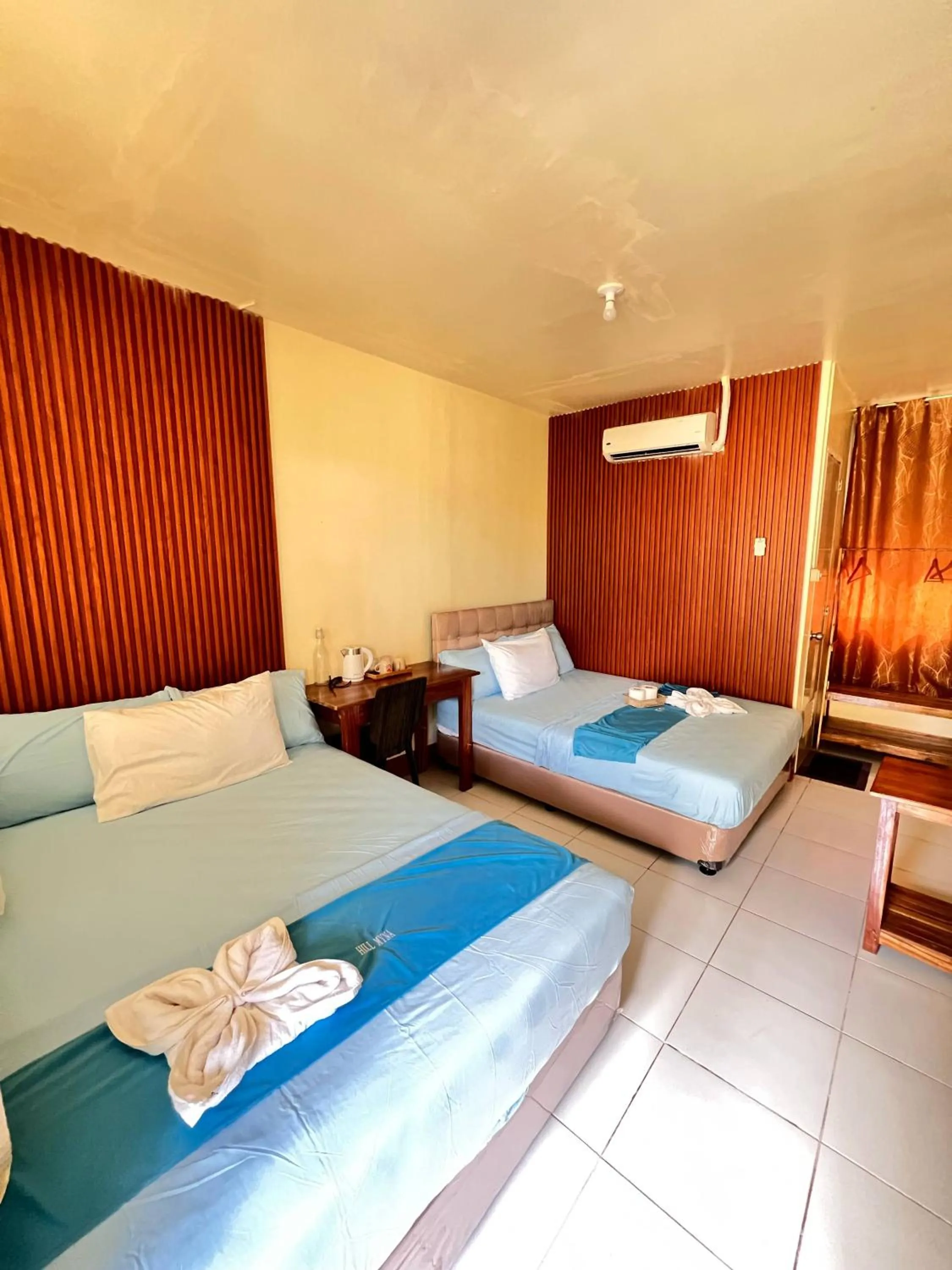 Bed in Hill Myna Beach Cottages