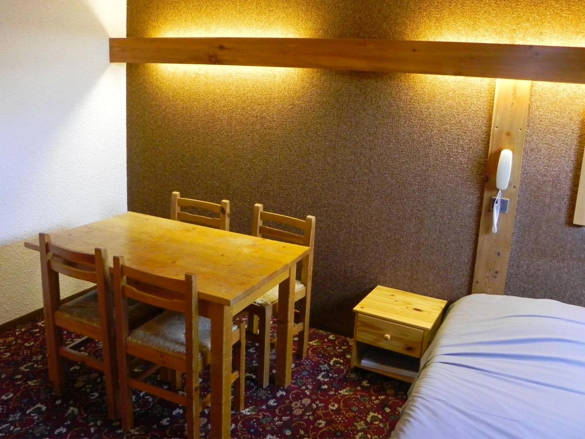 Bed in Hôtel Résidence Les Colchiques