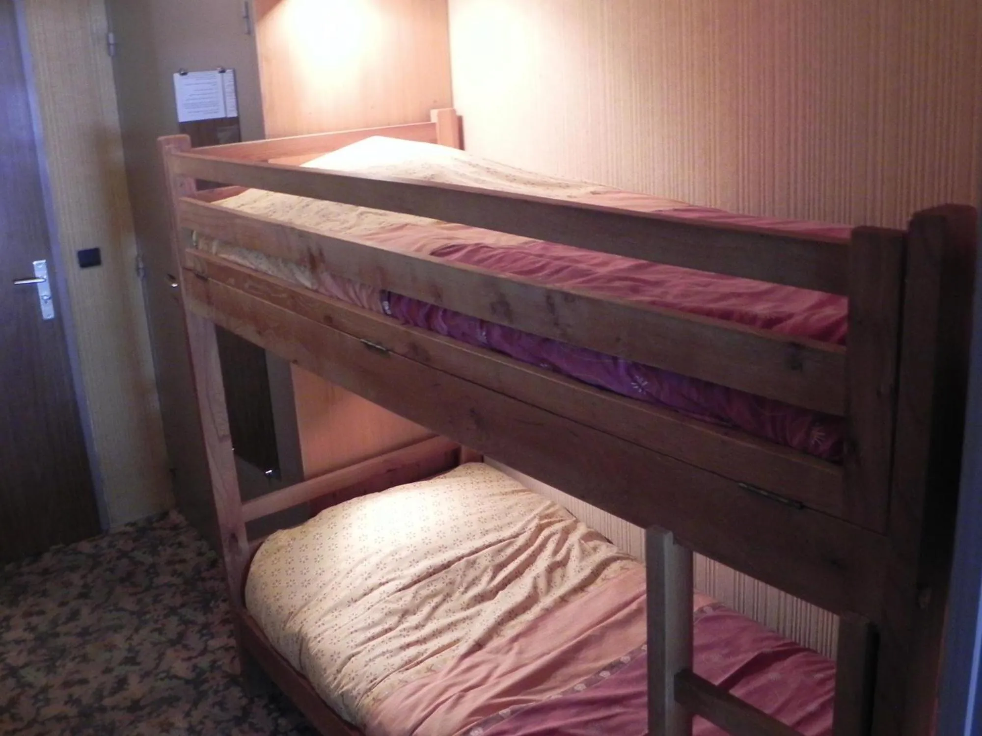 Bed in Hôtel Résidence Les Colchiques