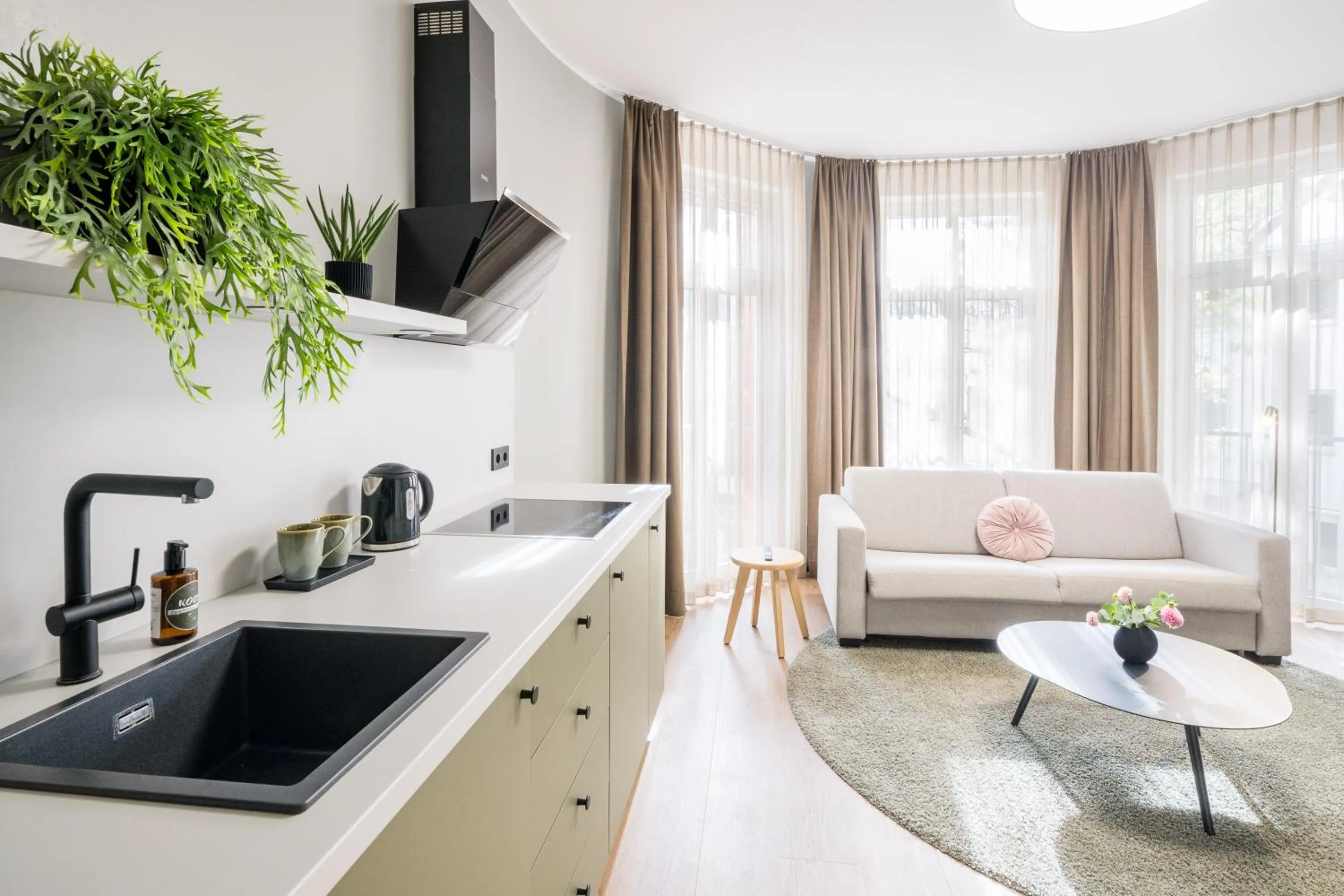 Kitchen or kitchenette in KOOS Hotel&Apartments - City Aparthotel