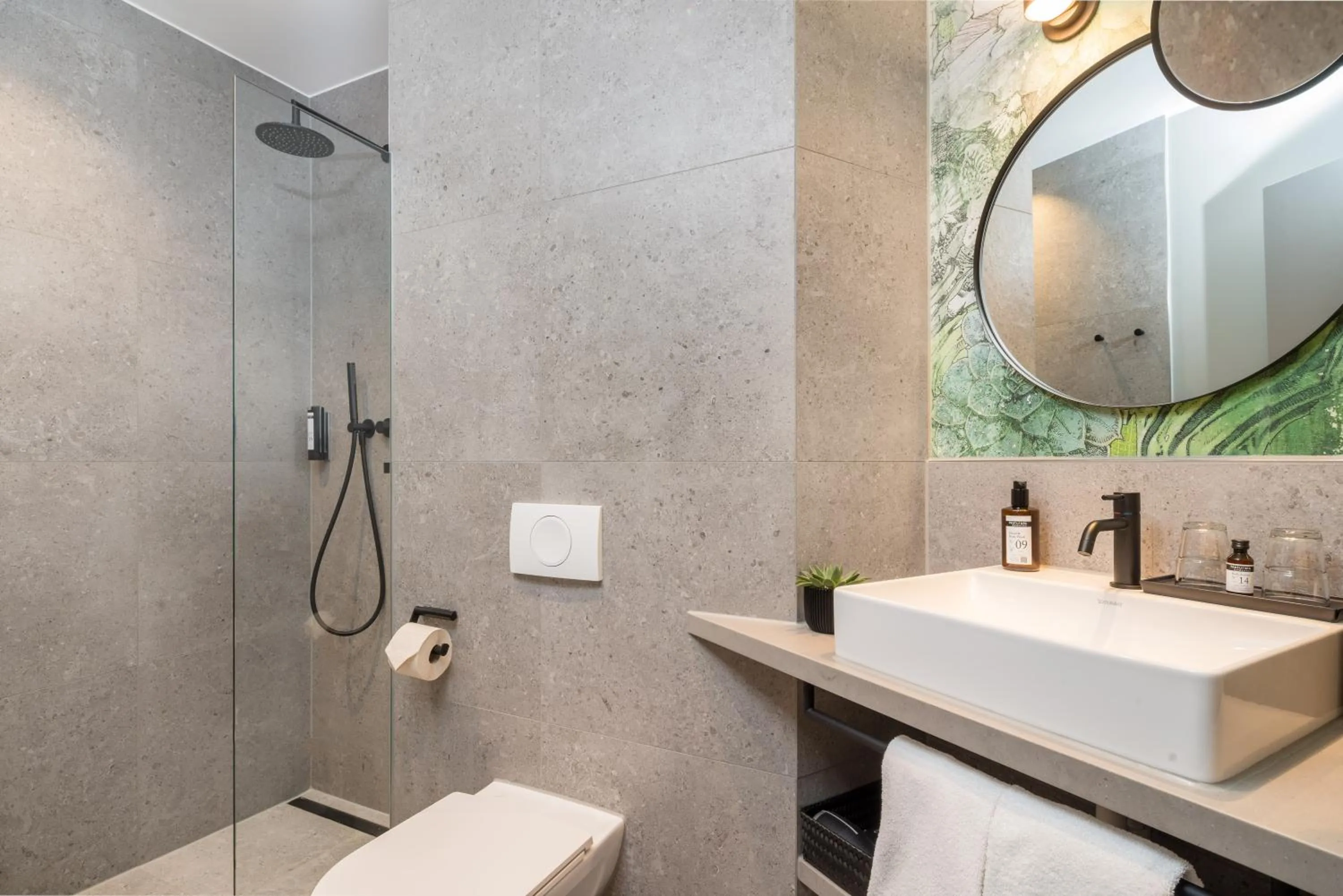 Bathroom in KOOS Hotel&Apartments - City Aparthotel