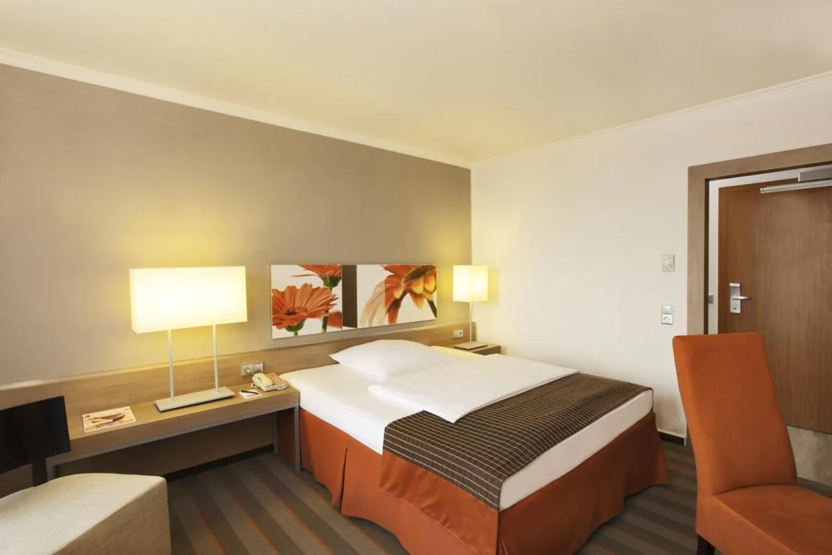 Bed in SOALTEE Hotel by Trip Inn Frankfurt Messe Tagungshotel