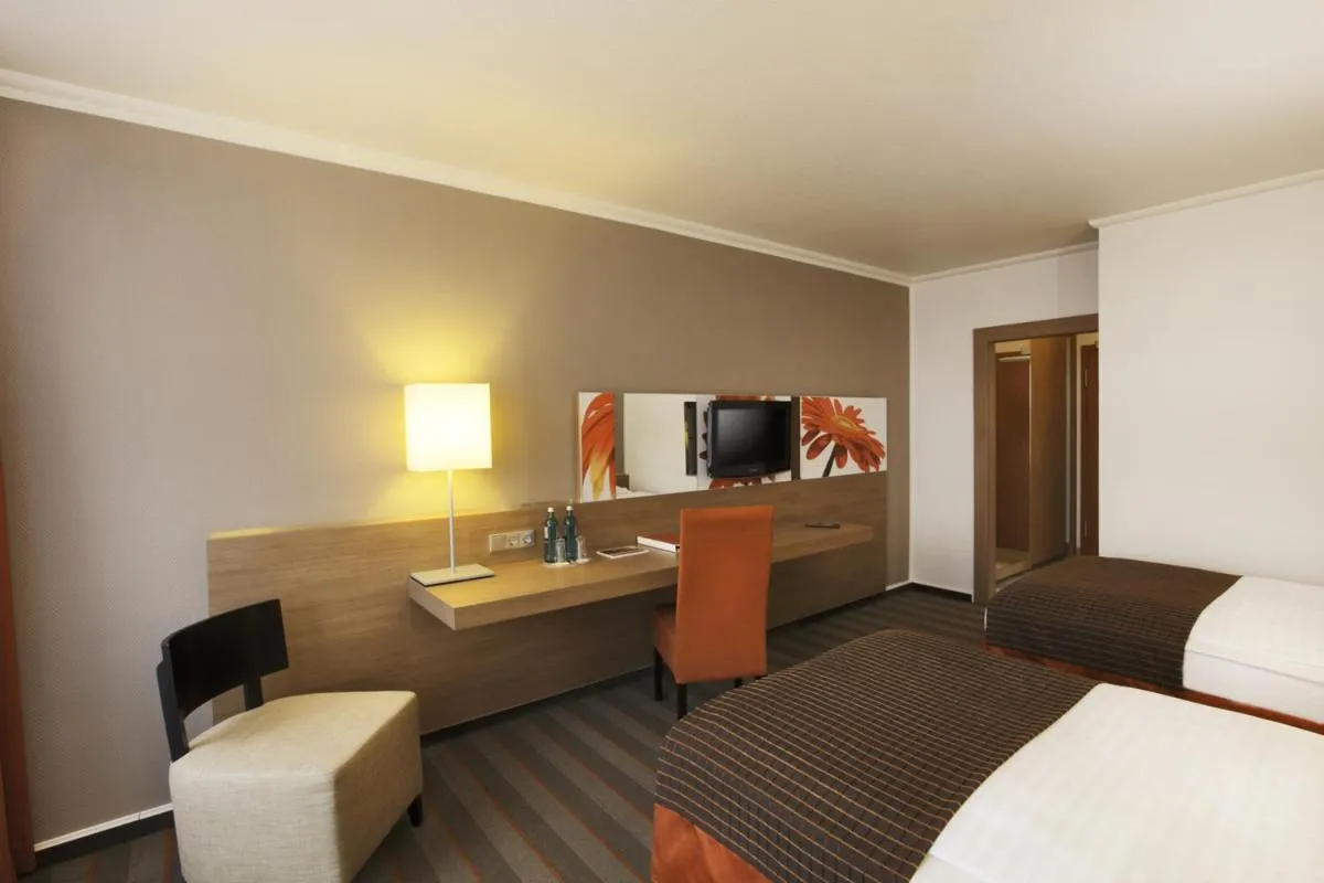 Bed in SOALTEE Hotel by Trip Inn Frankfurt Messe Tagungshotel