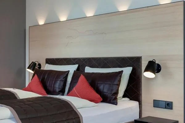 Photo of the whole room, Bed in Boutiquehotel zur Winzerstube - Adults Only