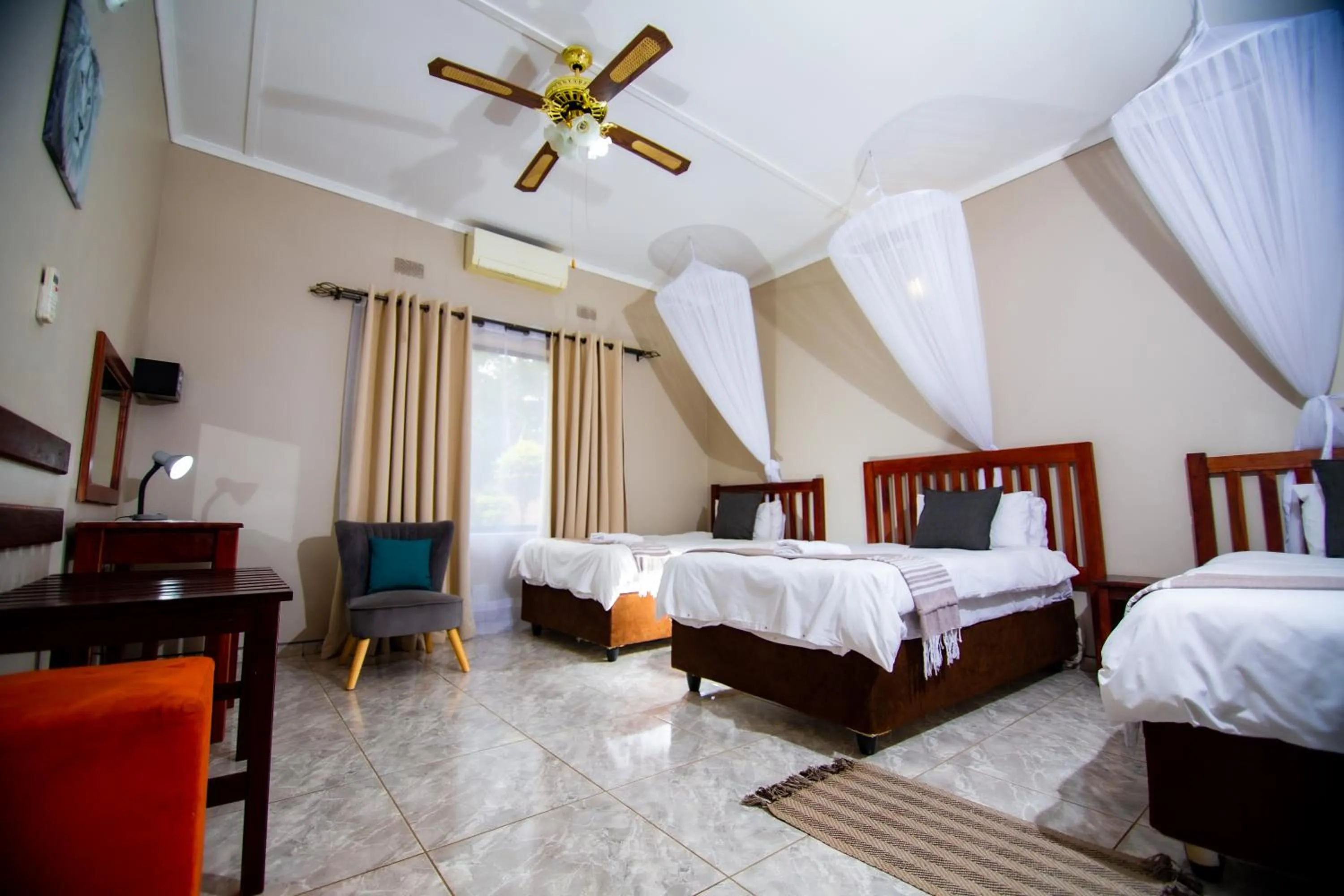 Bed in Dzimbahwe Guest Lodge