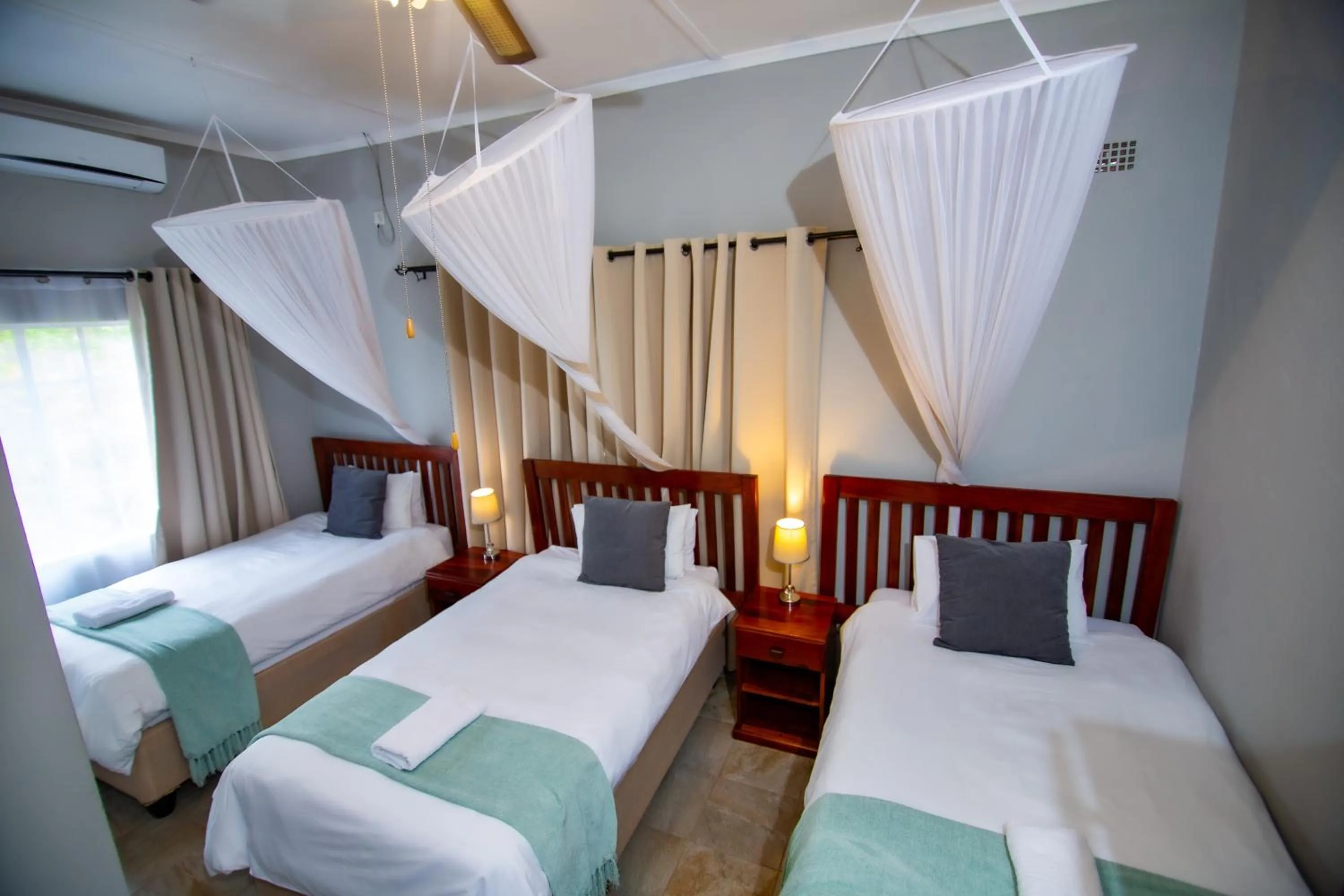 Bed in Dzimbahwe Guest Lodge