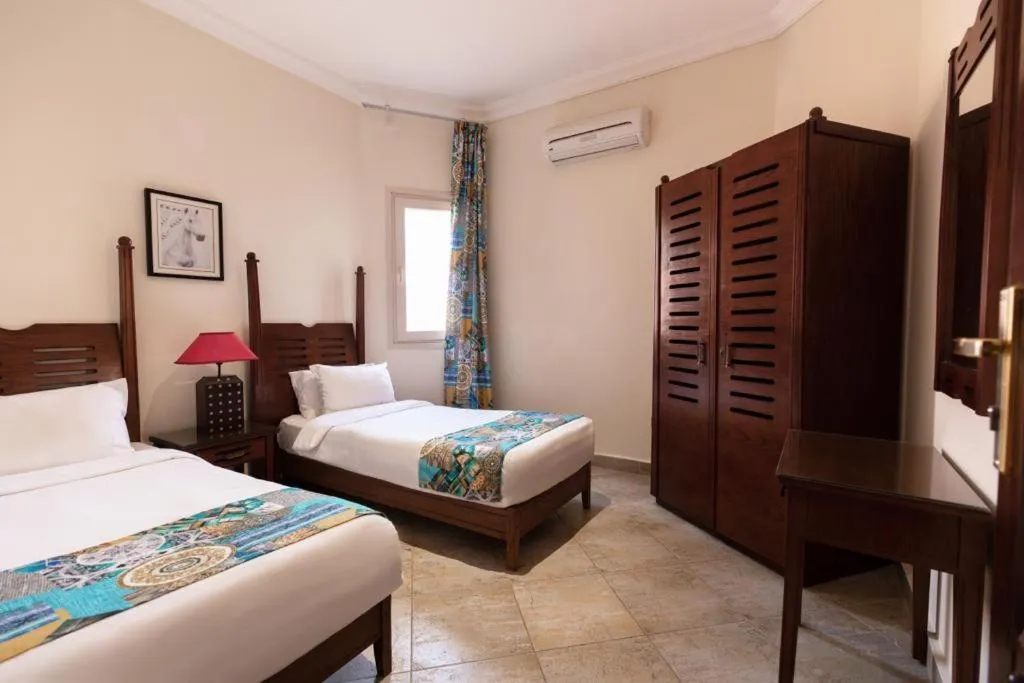 Bed in Golden Ocean Marina Hotel