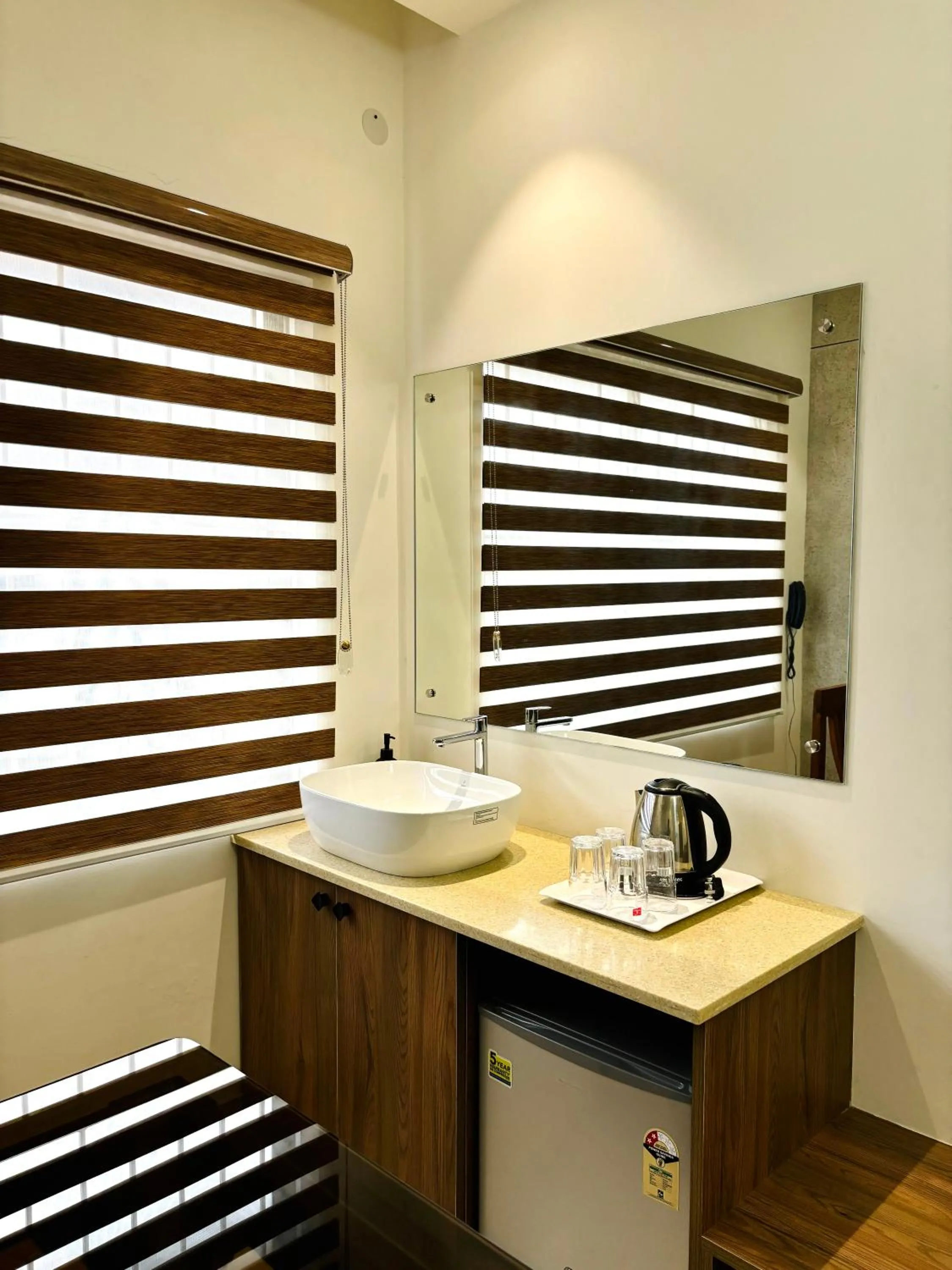 Kitchen or kitchenette in Hotel Citywalk Residency