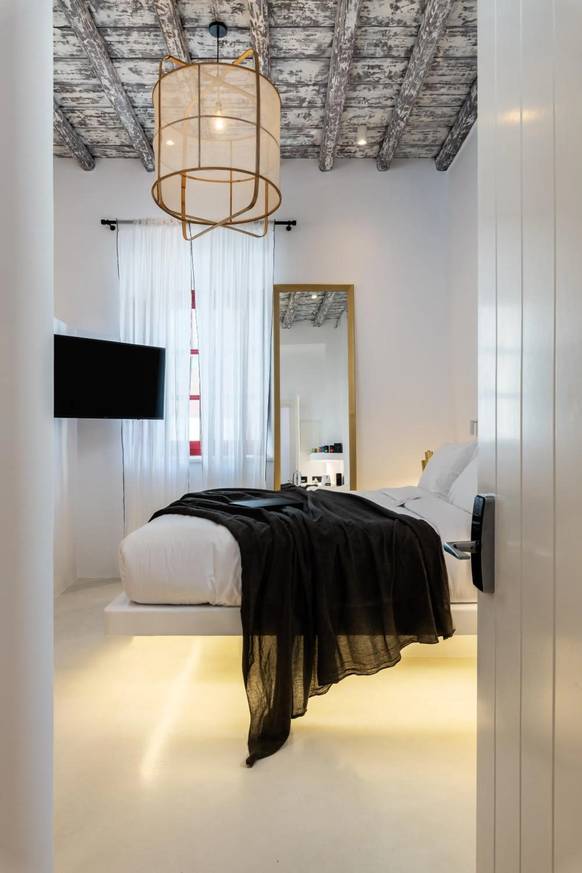 Bed in The TownHouse Mykonos