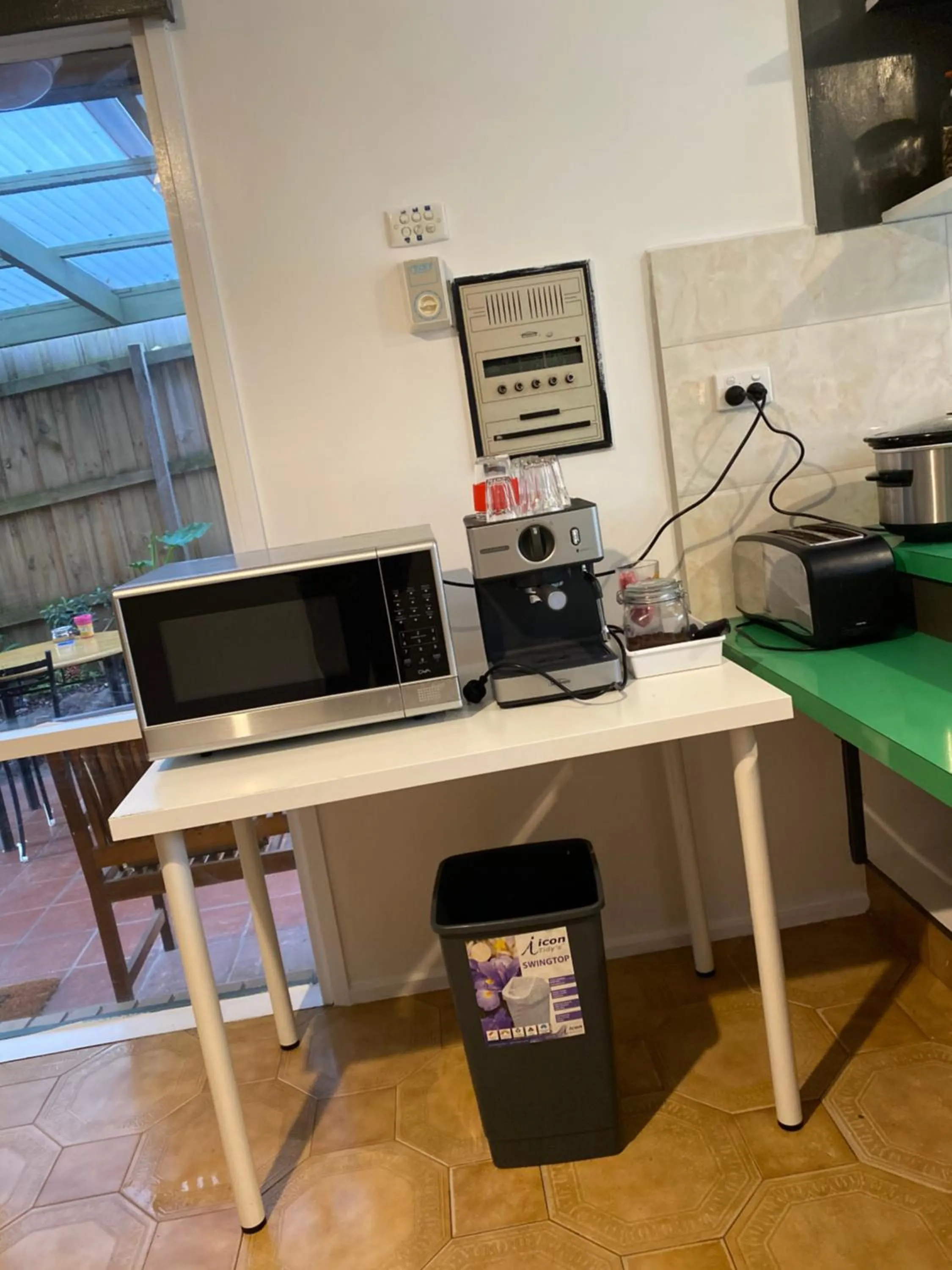 Communal kitchen in ADA Homestay