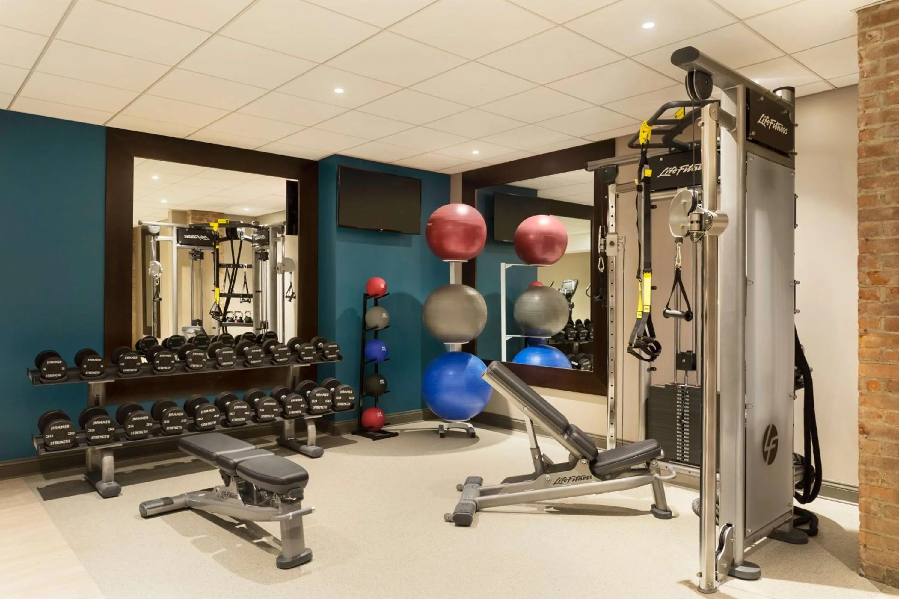 Fitness centre/facilities in Hotel Saranac, Curio Collection By Hilton
