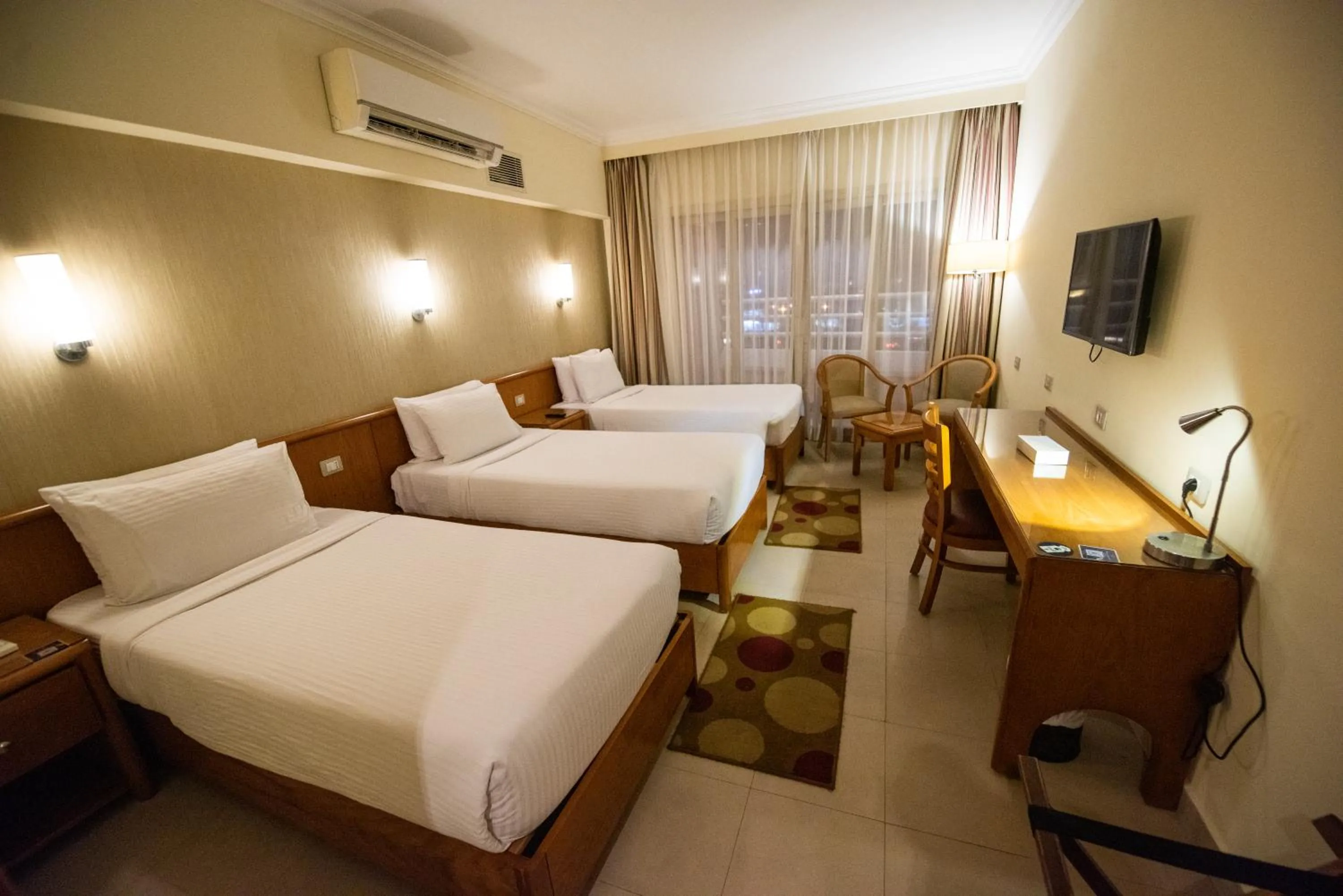 Bed in The Grand Plaza Hotel Smouha