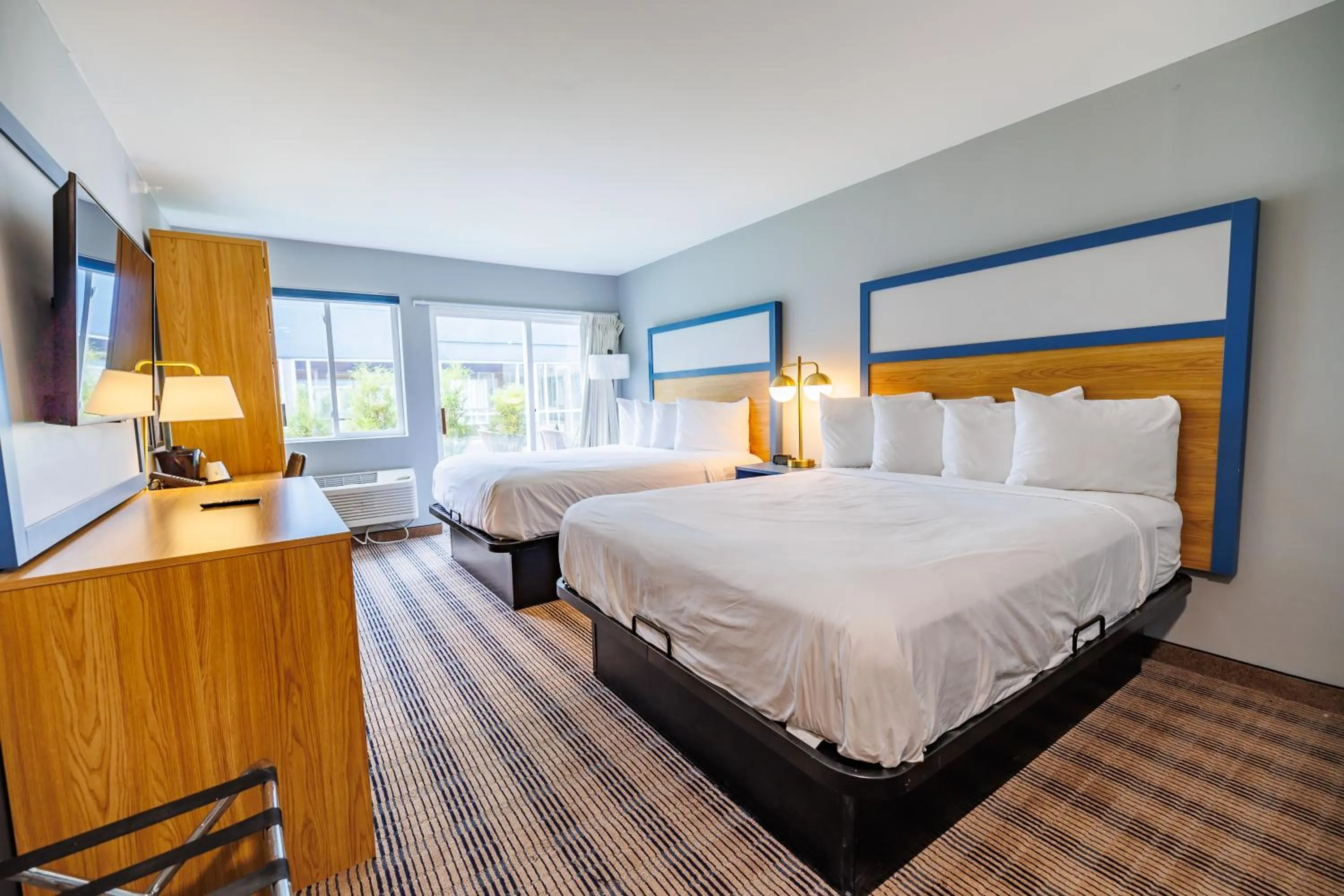 TV and multimedia, Bed in AmericInn by Wyndham Omaha Near Zoo