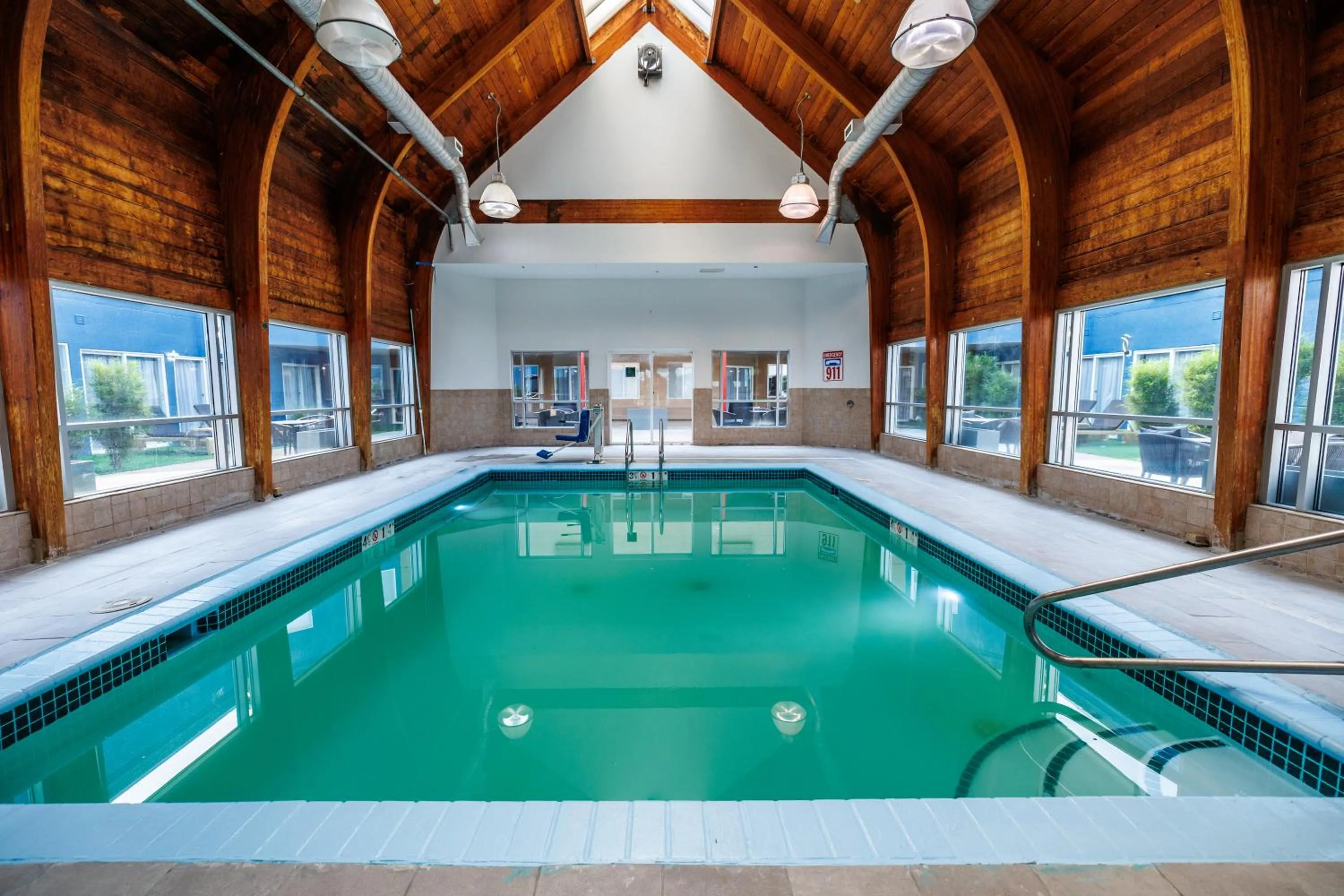 Swimming pool in AmericInn by Wyndham Omaha Near Zoo