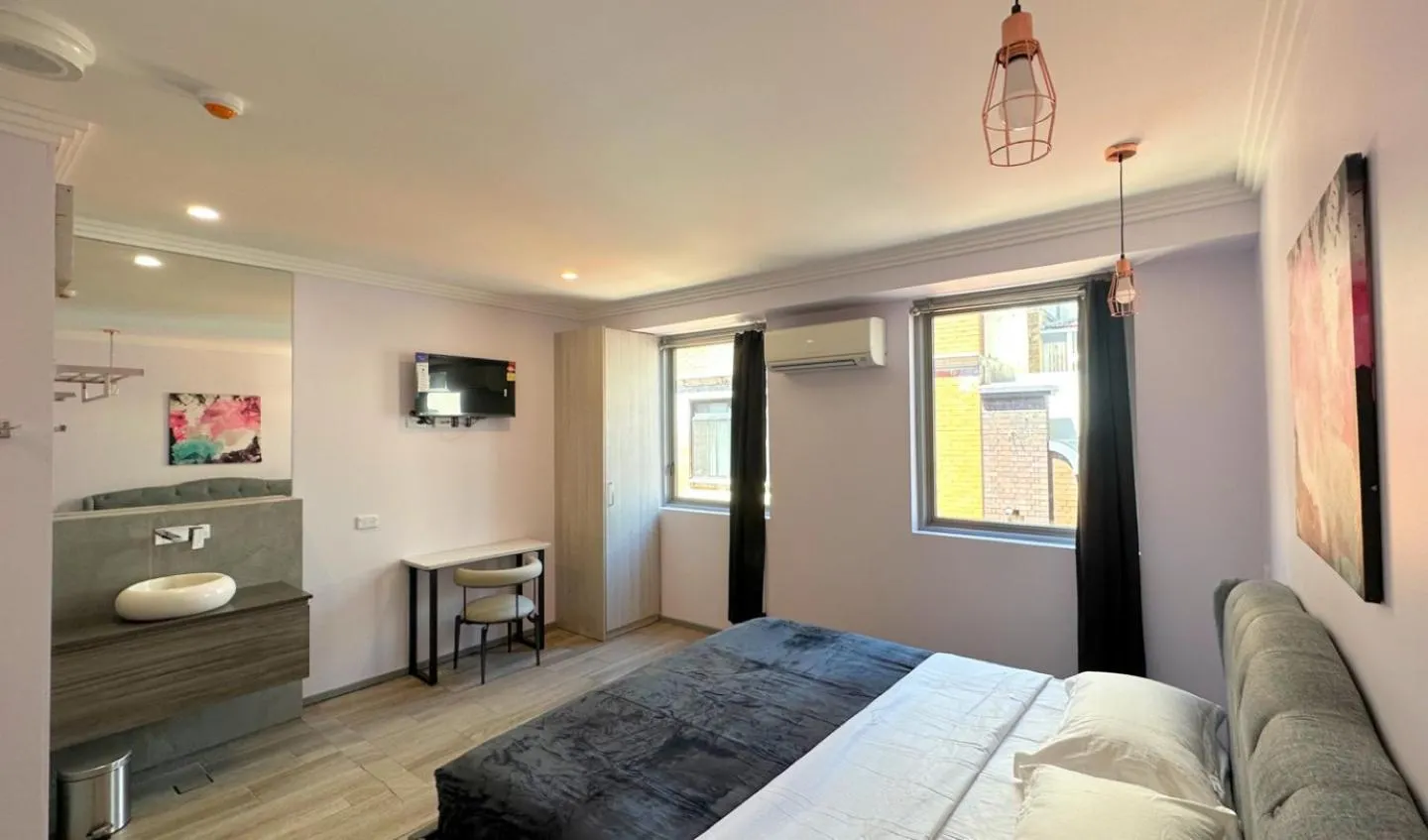 Bed in Sydney RiseOn Hotel