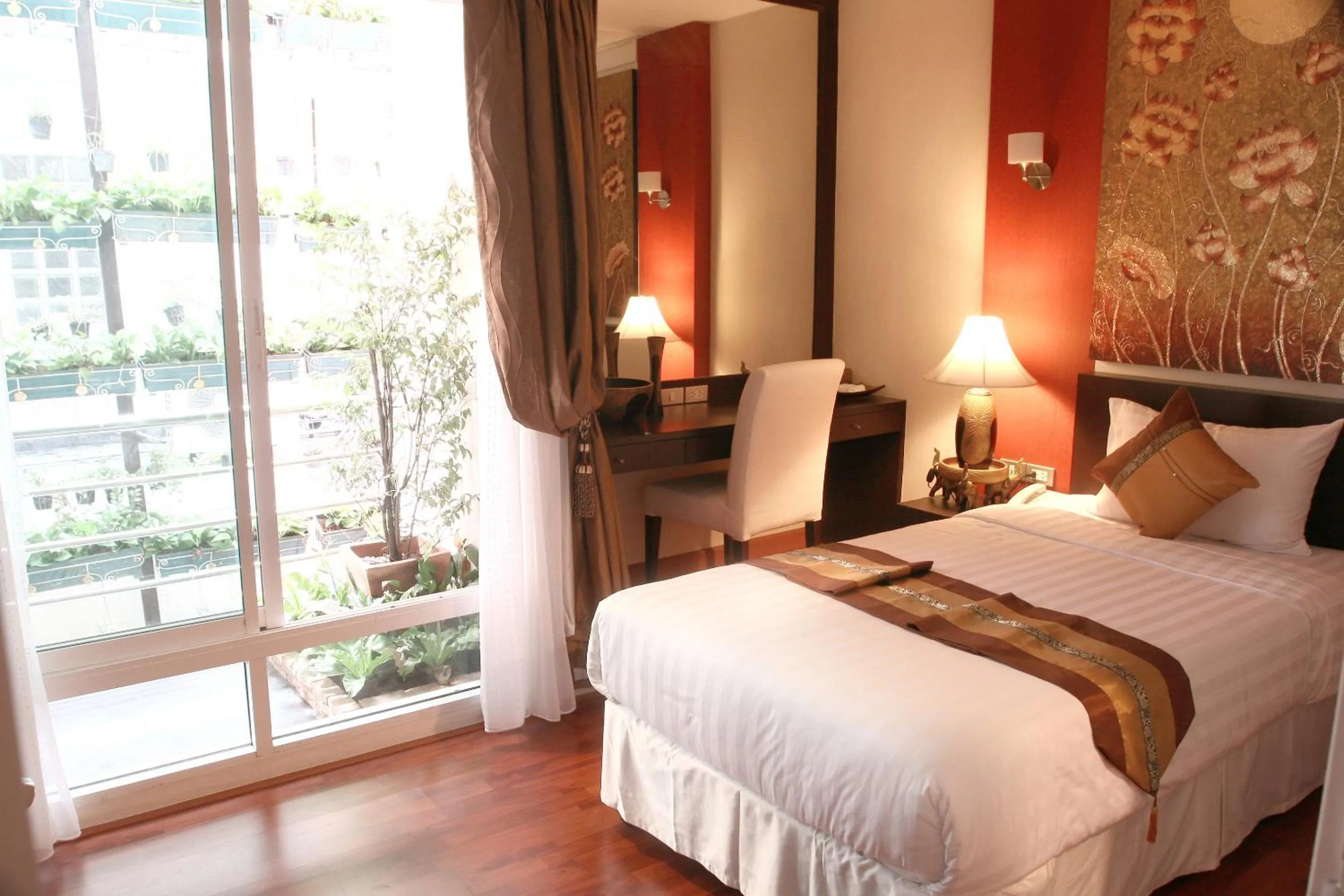 Photo of the whole room, Bed in Mirth Sathorn Hotel