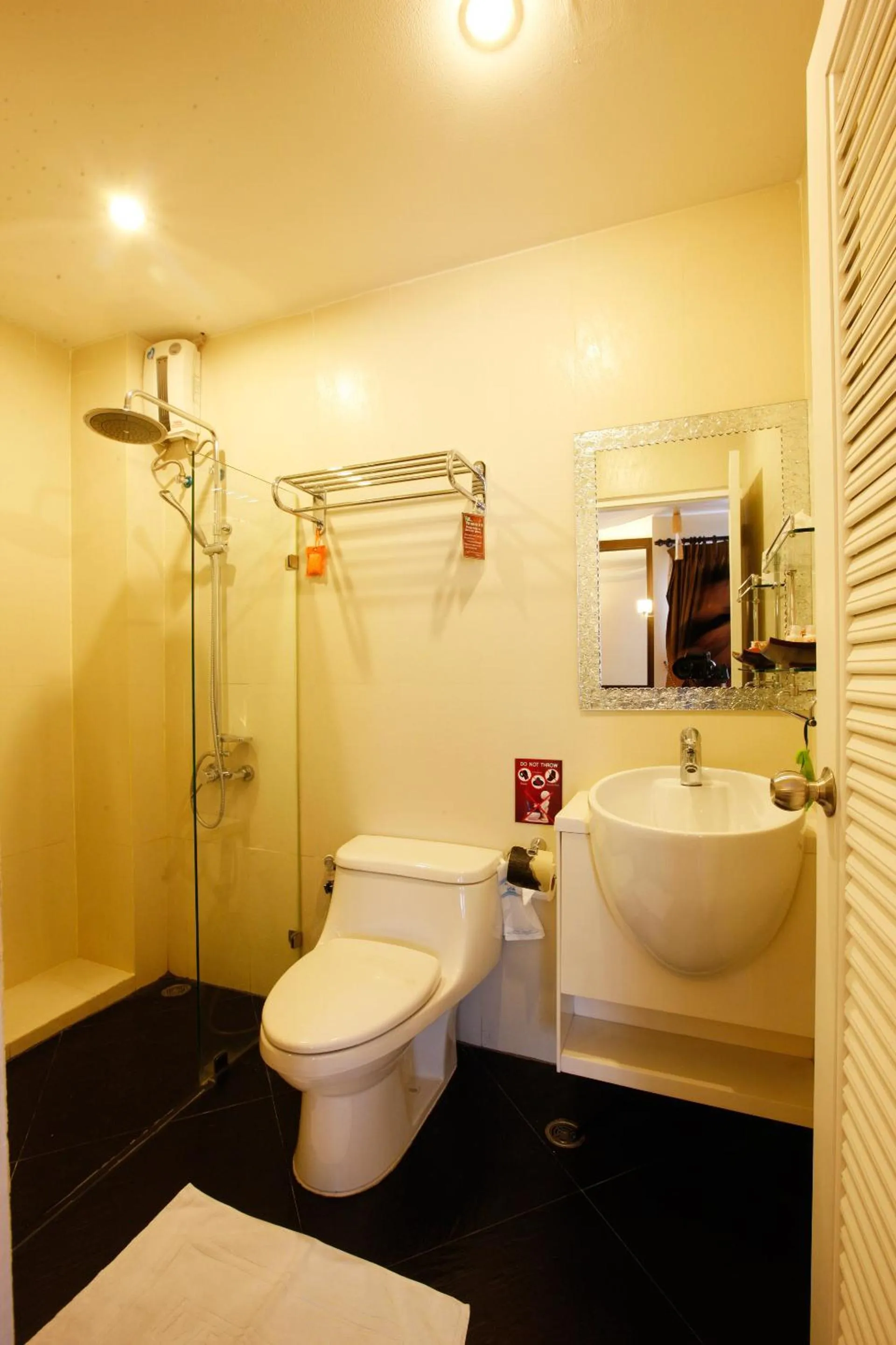 Bathroom in Mirth Sathorn Hotel