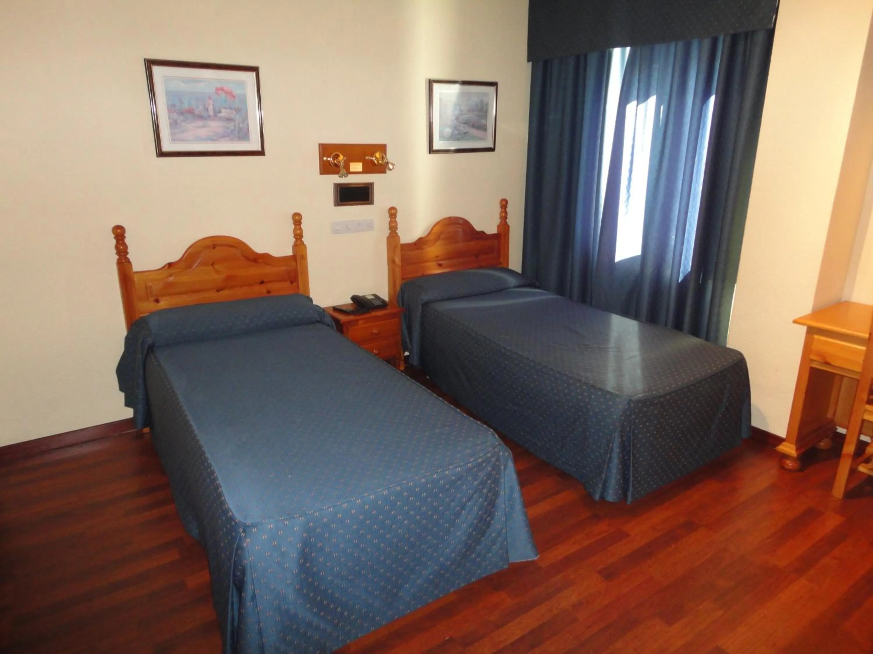 Bed in Hotel Nevasur