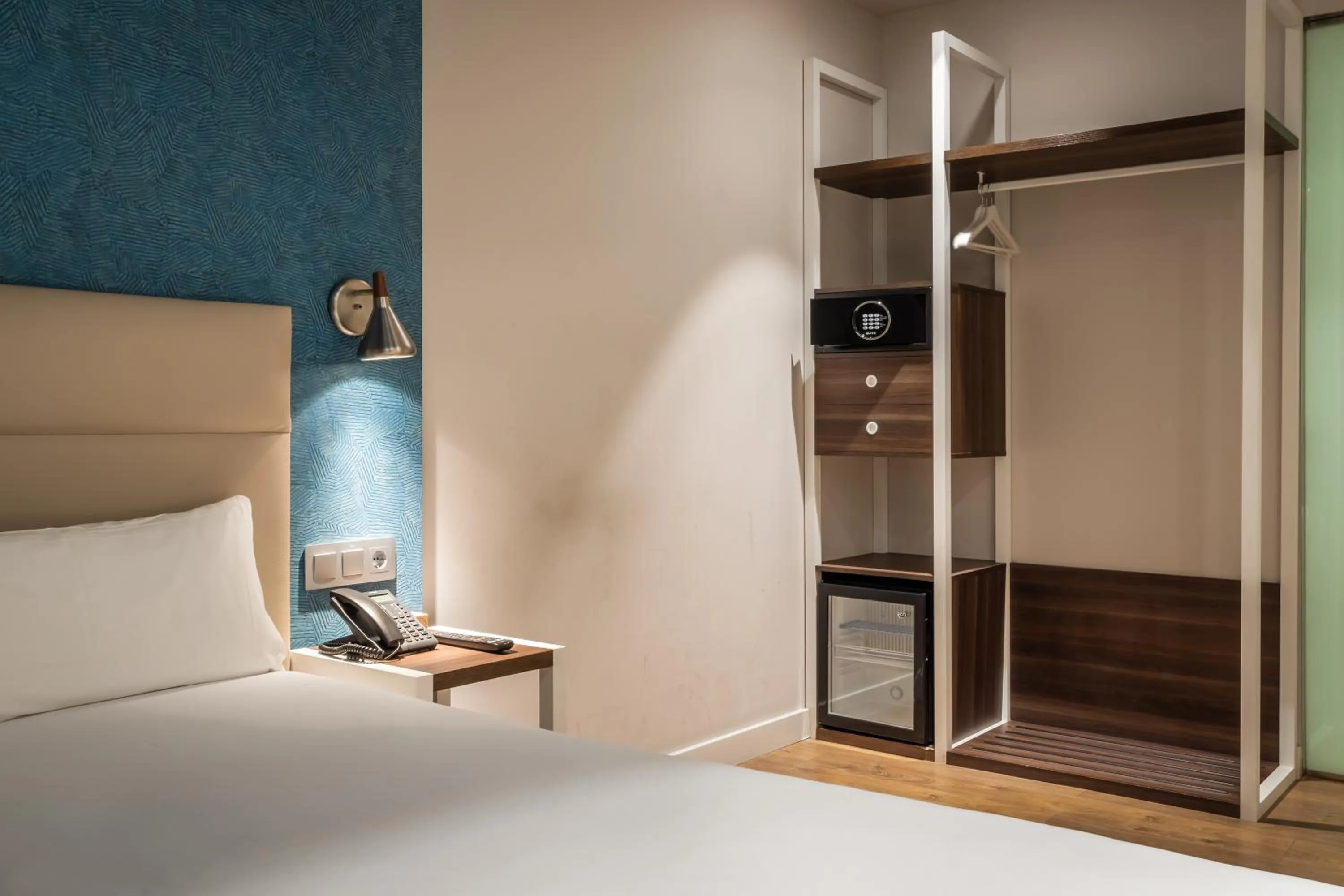 Bed in Arya Stadium Hotel