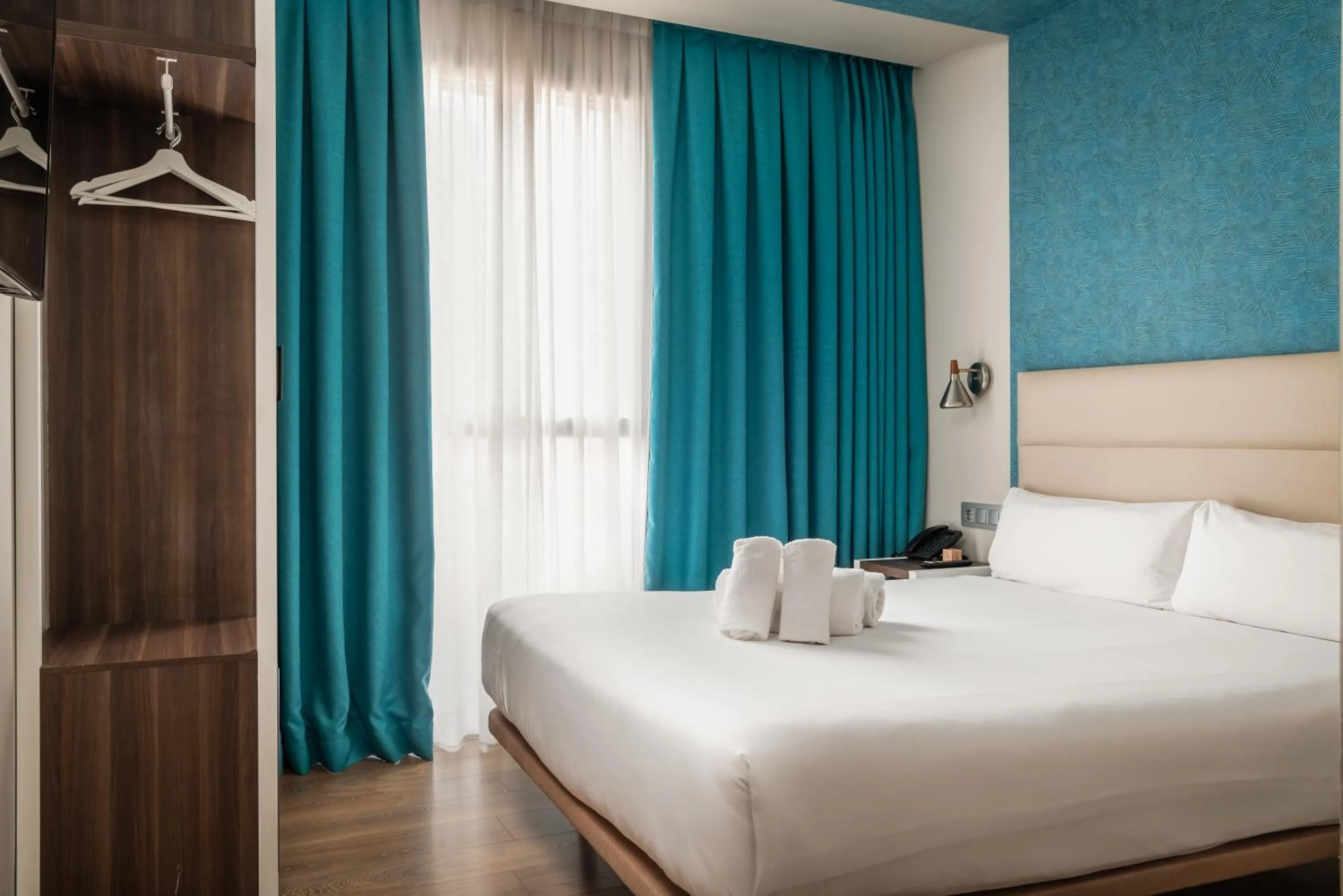 Bed in Arya Stadium Hotel