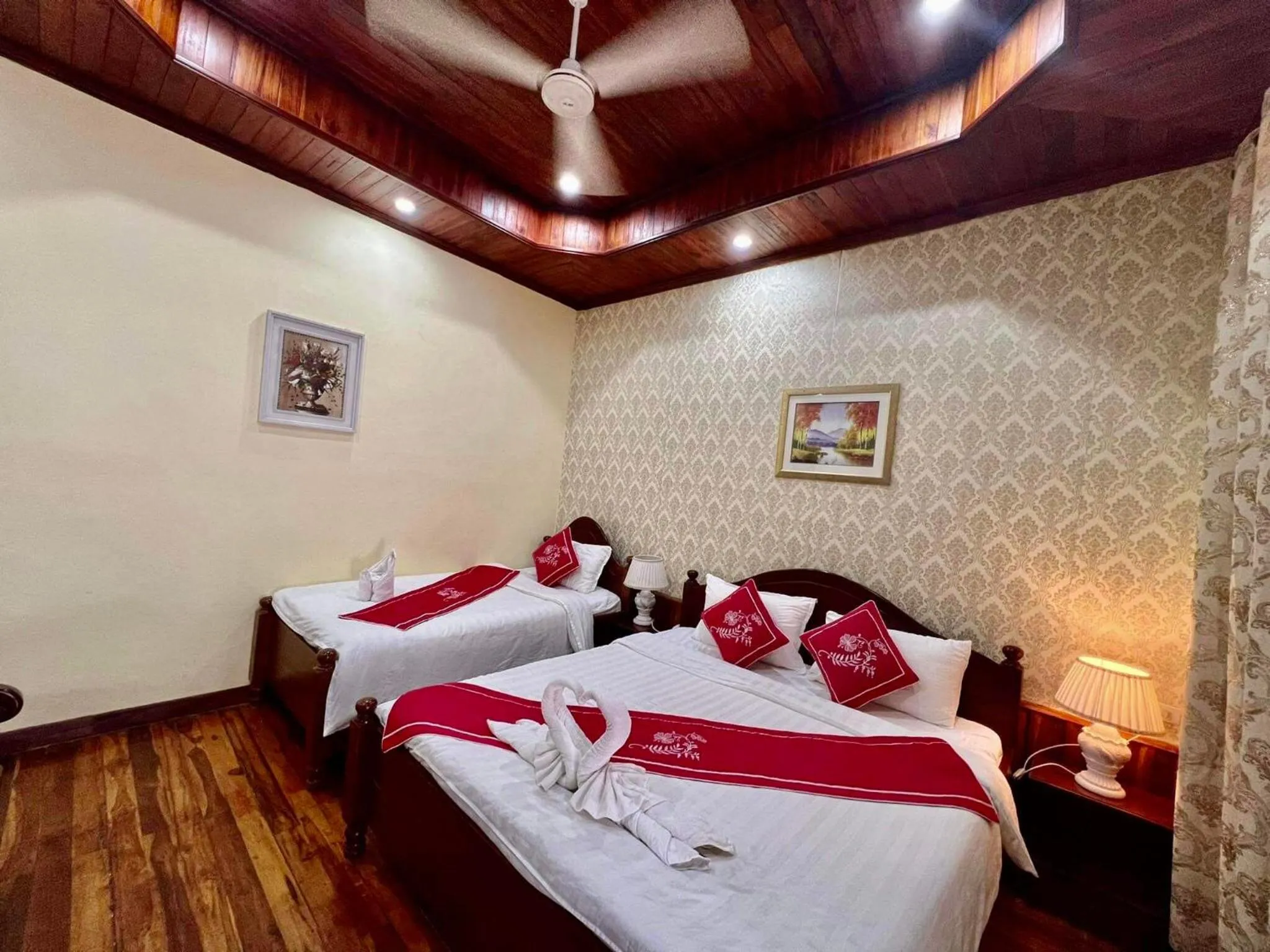 Bed in Villa Phathana Boutique Hotel