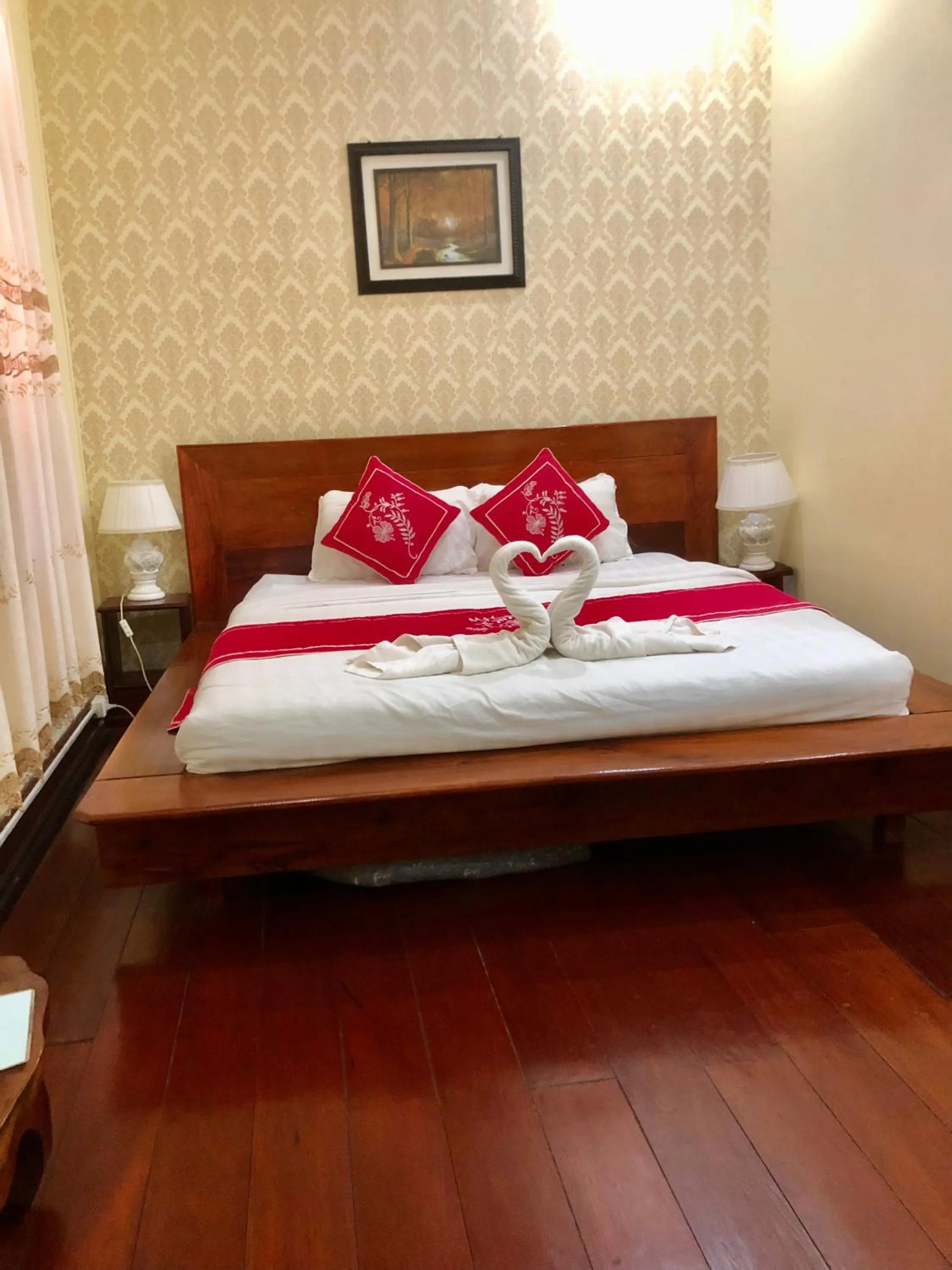 Bed in Villa Phathana Boutique Hotel
