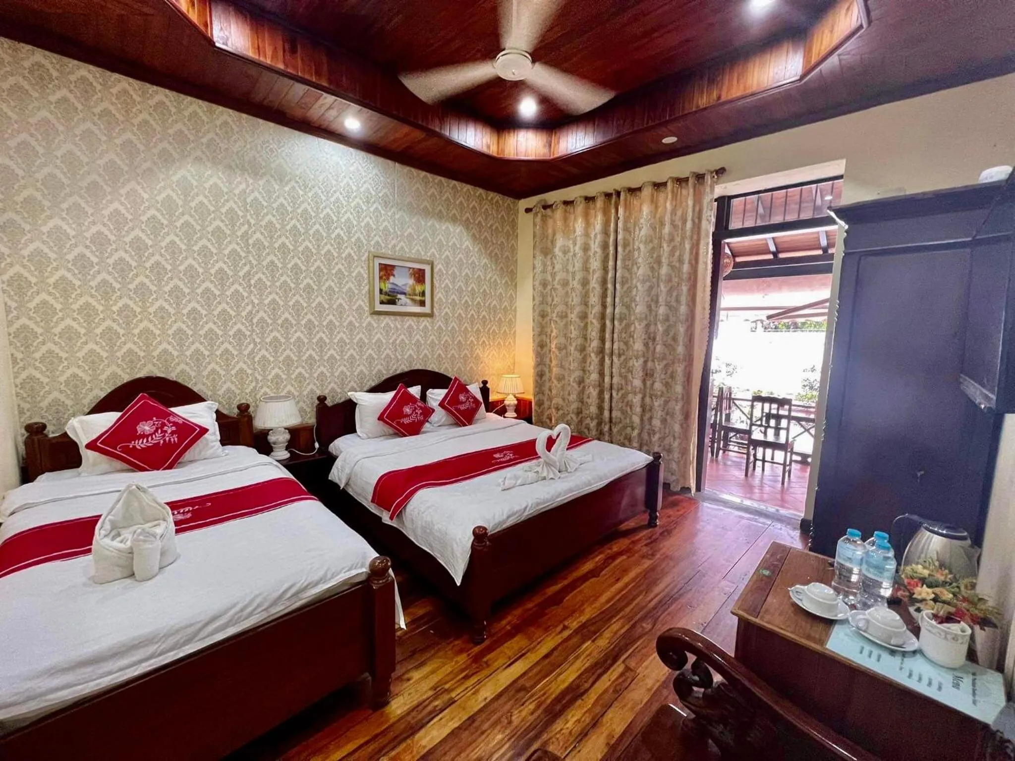 Bed in Villa Phathana Boutique Hotel