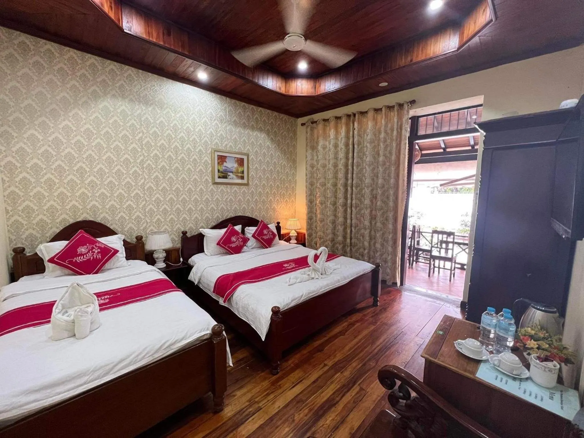 Bed in Villa Phathana Boutique Hotel