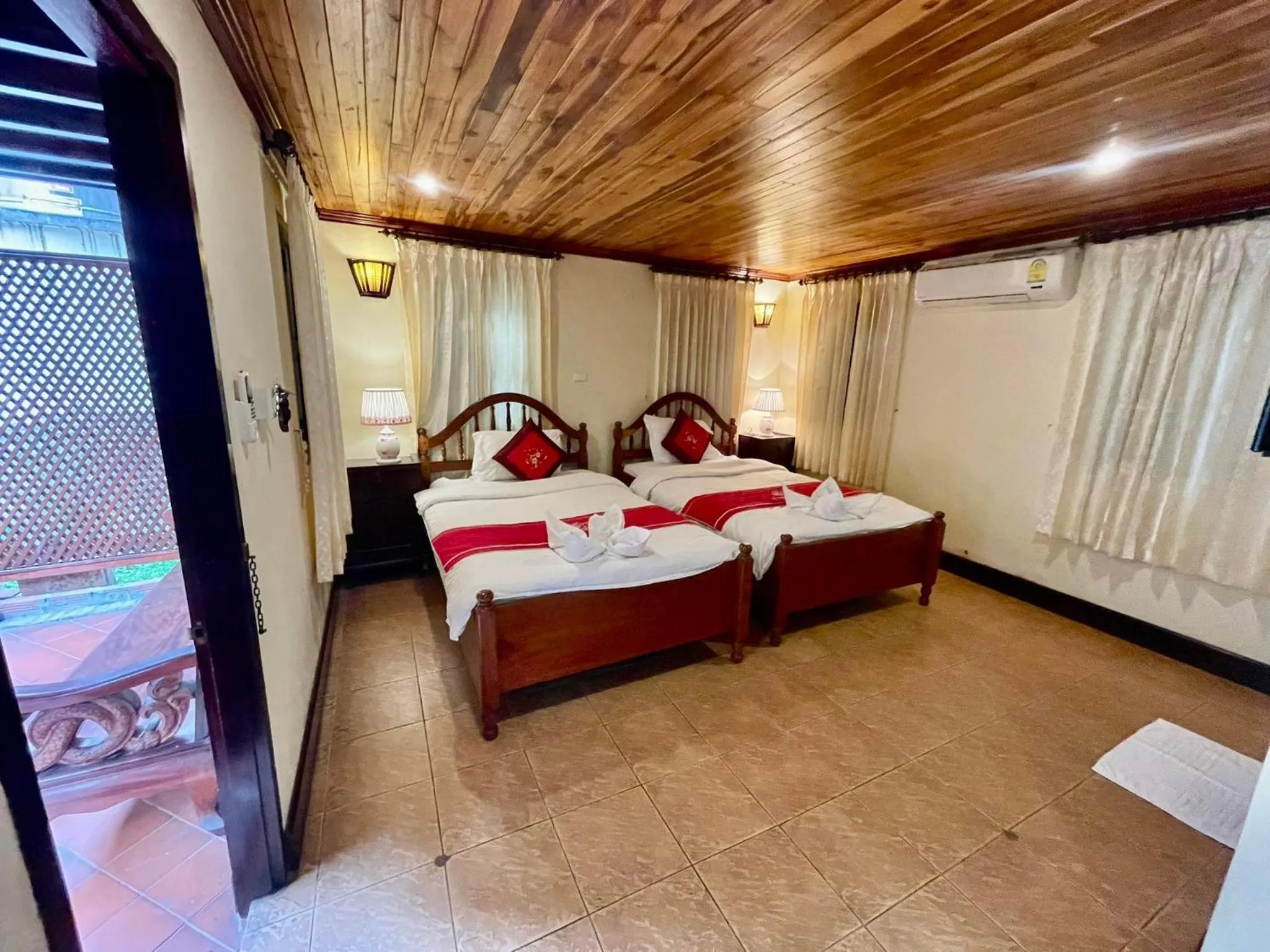 Bed in Villa Phathana Boutique Hotel