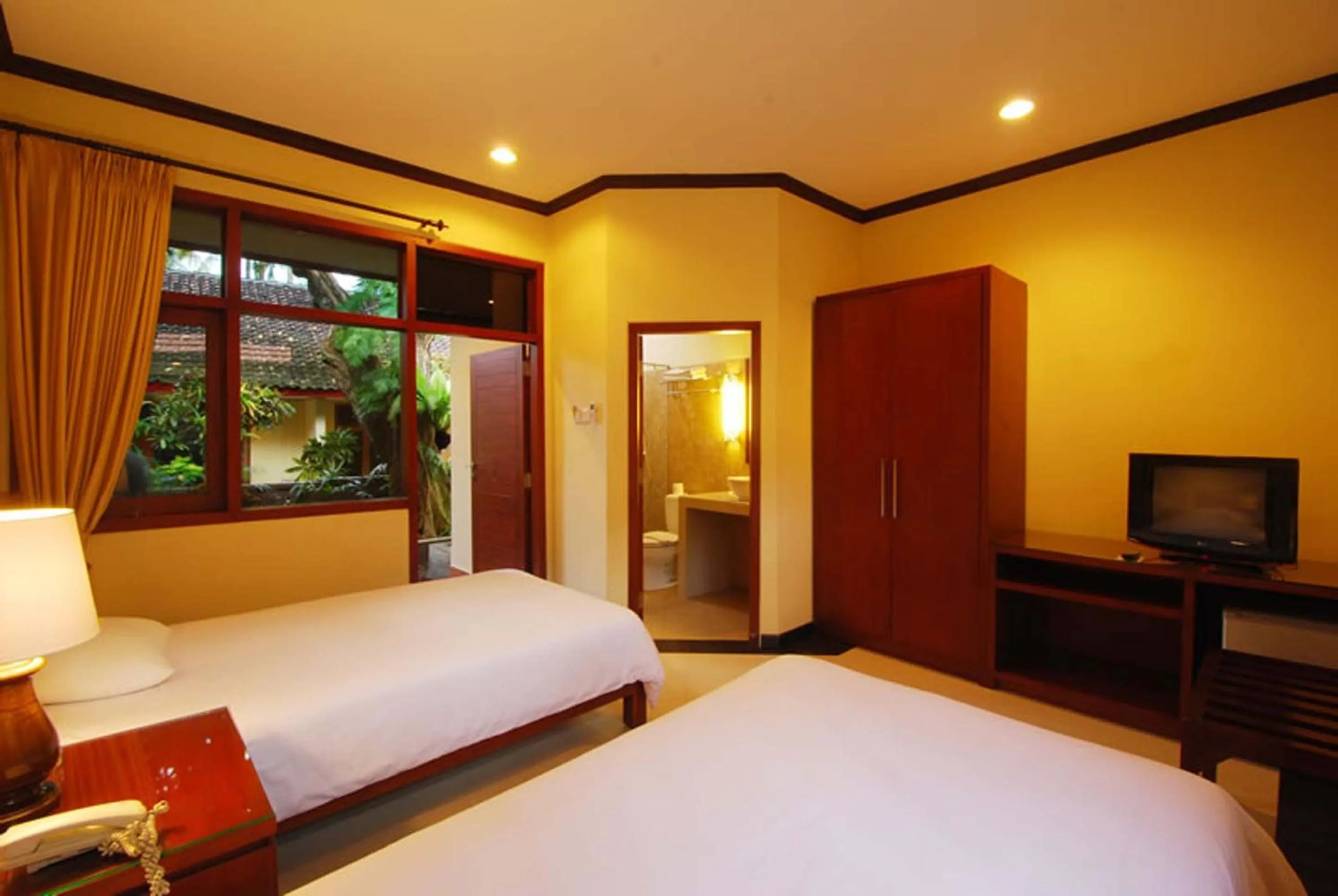 Bedroom, Bed in Yulia Beach Inn Kuta
