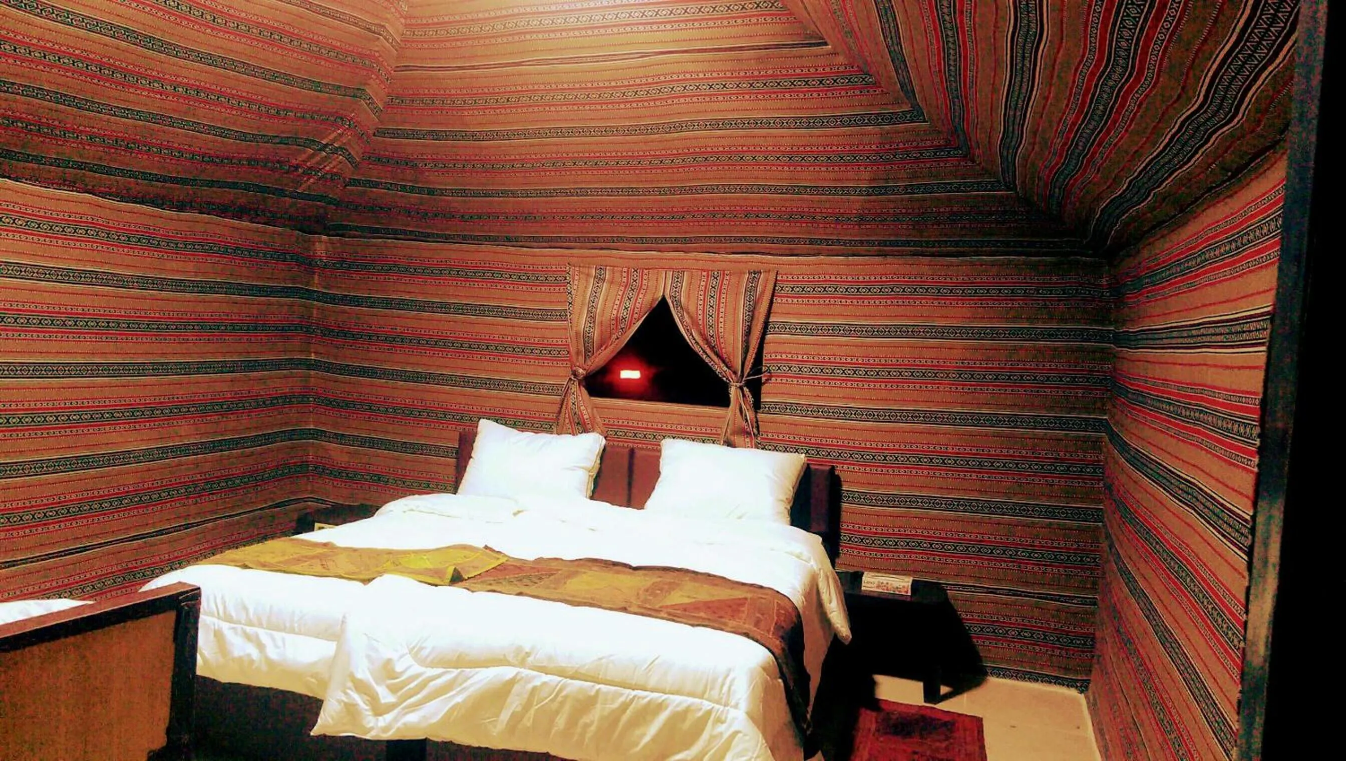 Bed in Beyond Wadi Rum Camp