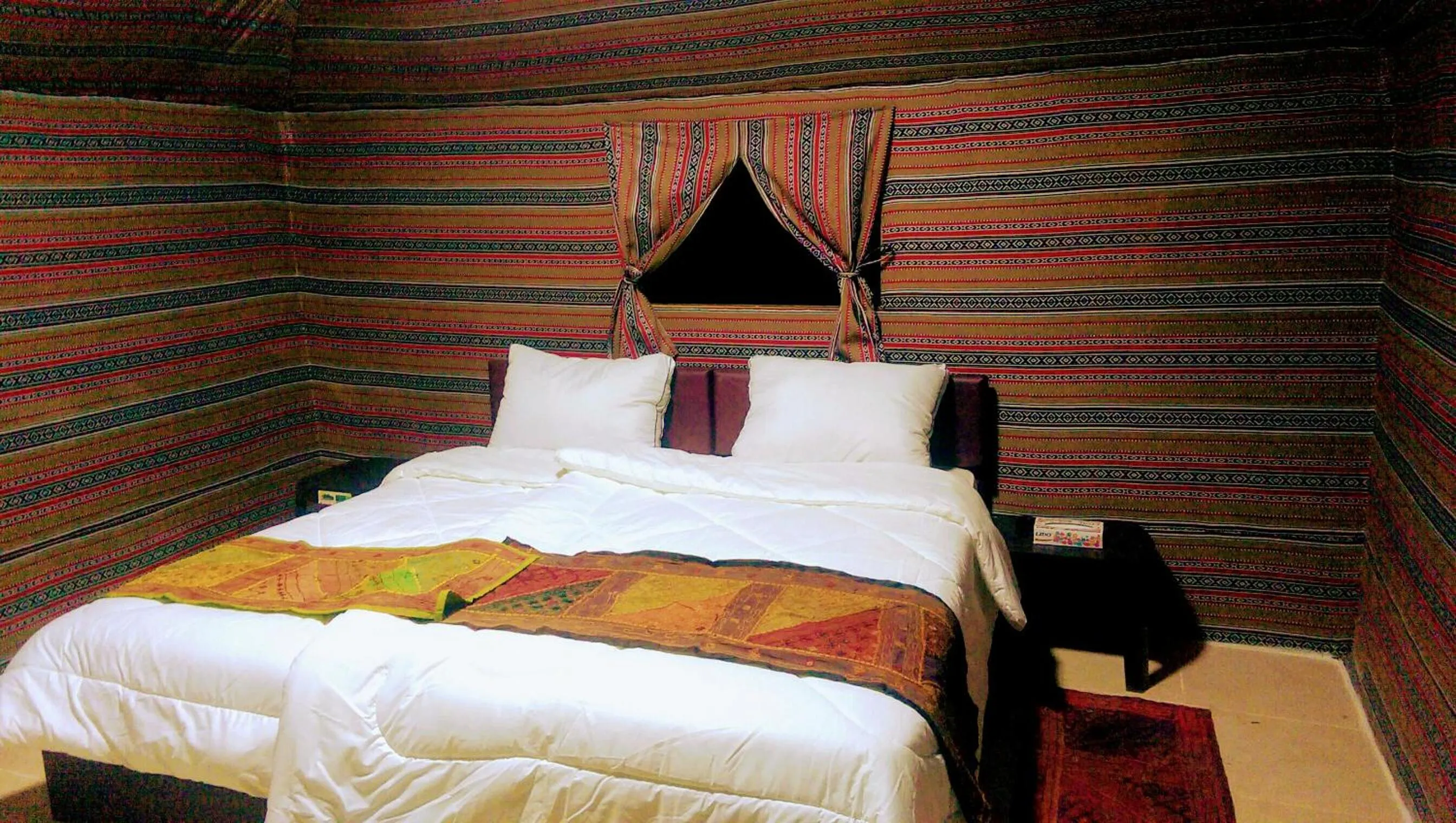 Bed in Beyond Wadi Rum Camp