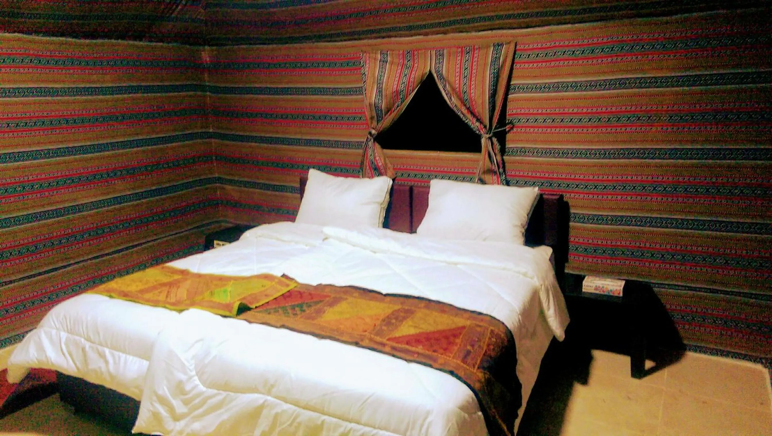 Bed in Beyond Wadi Rum Camp
