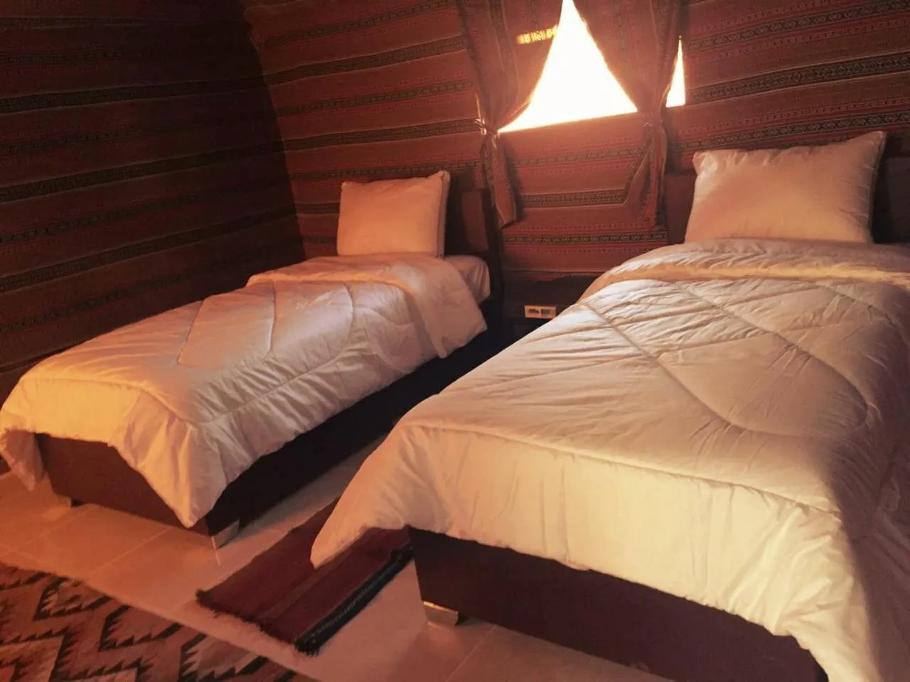 Bed in Beyond Wadi Rum Camp
