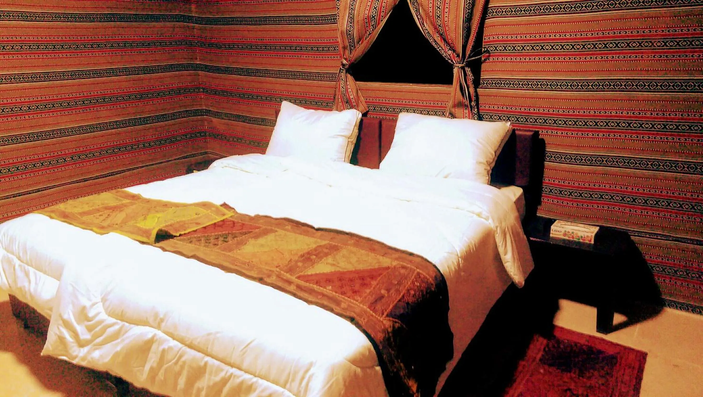 Bed in Beyond Wadi Rum Camp