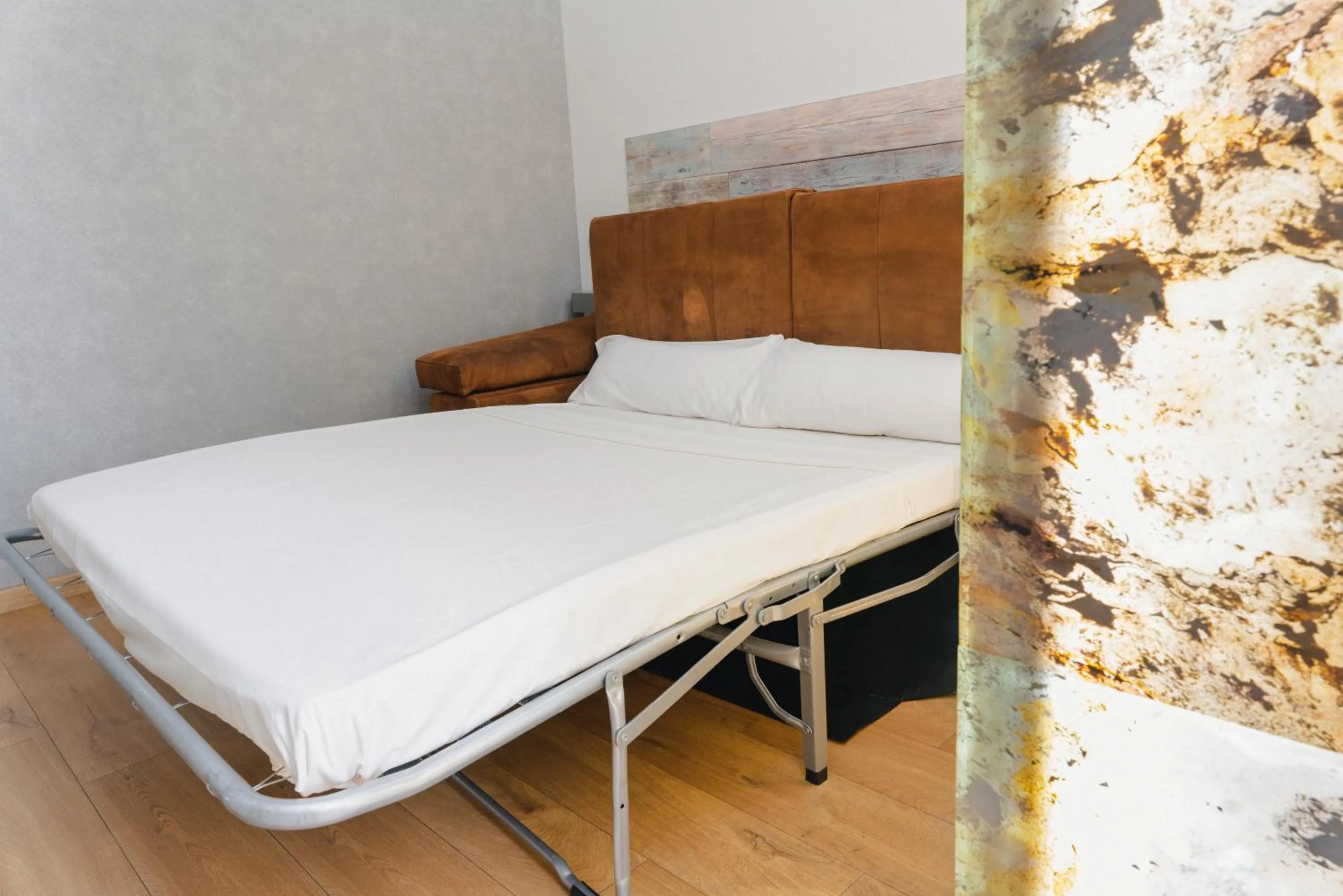 Bed in Cosmopolitan Boutique Rambla