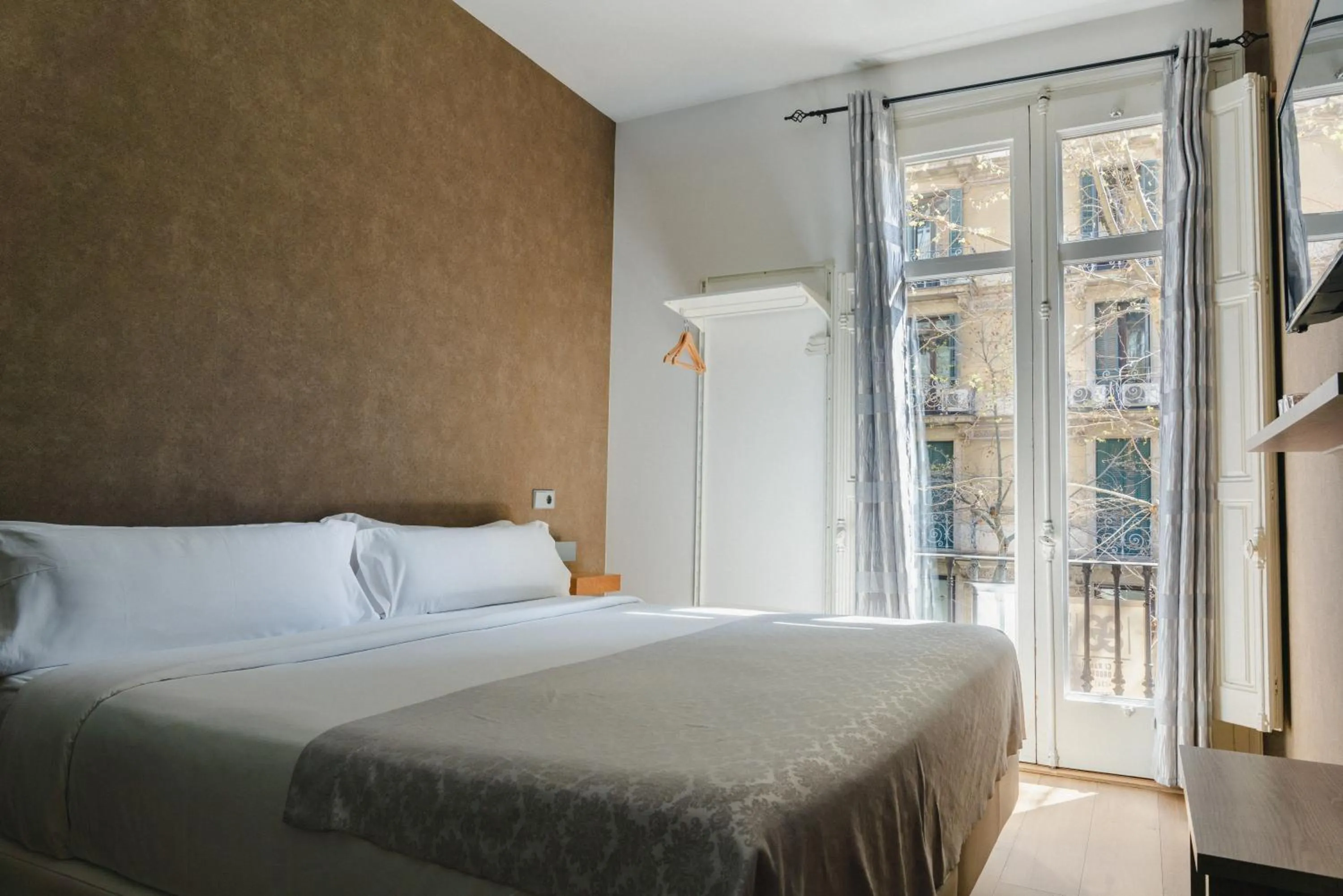 Bed in Cosmopolitan Boutique Rambla