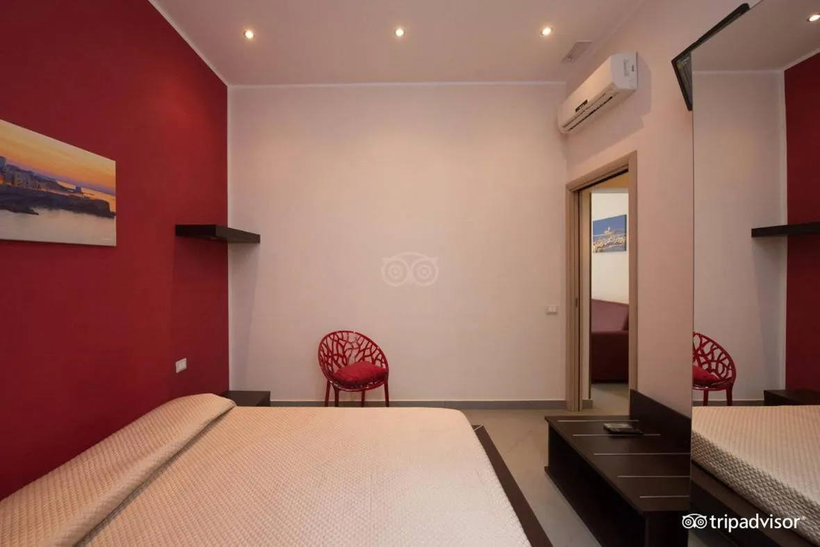 Photo of the whole room, Bed in Palazzo Dei Corsari