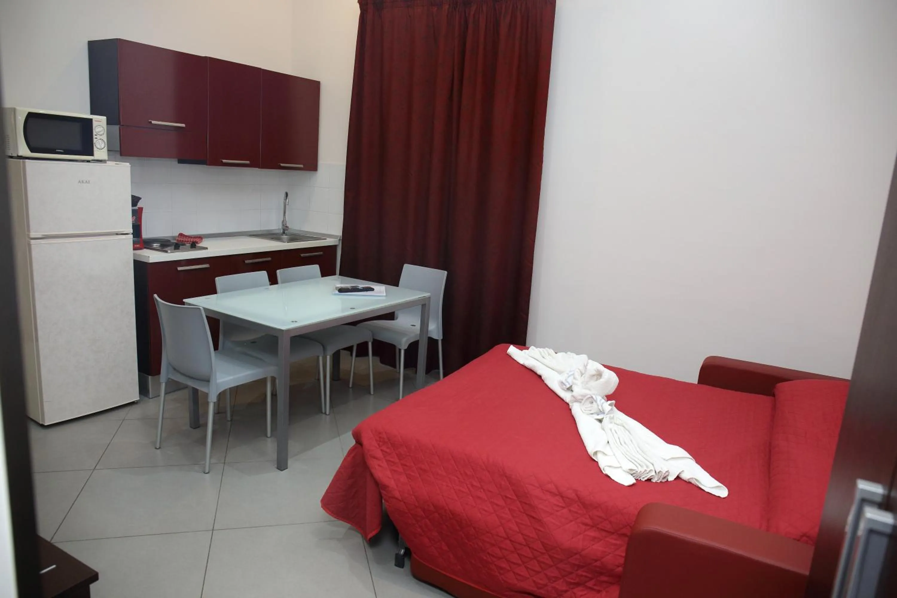 Living room, Bed in Palazzo Dei Corsari