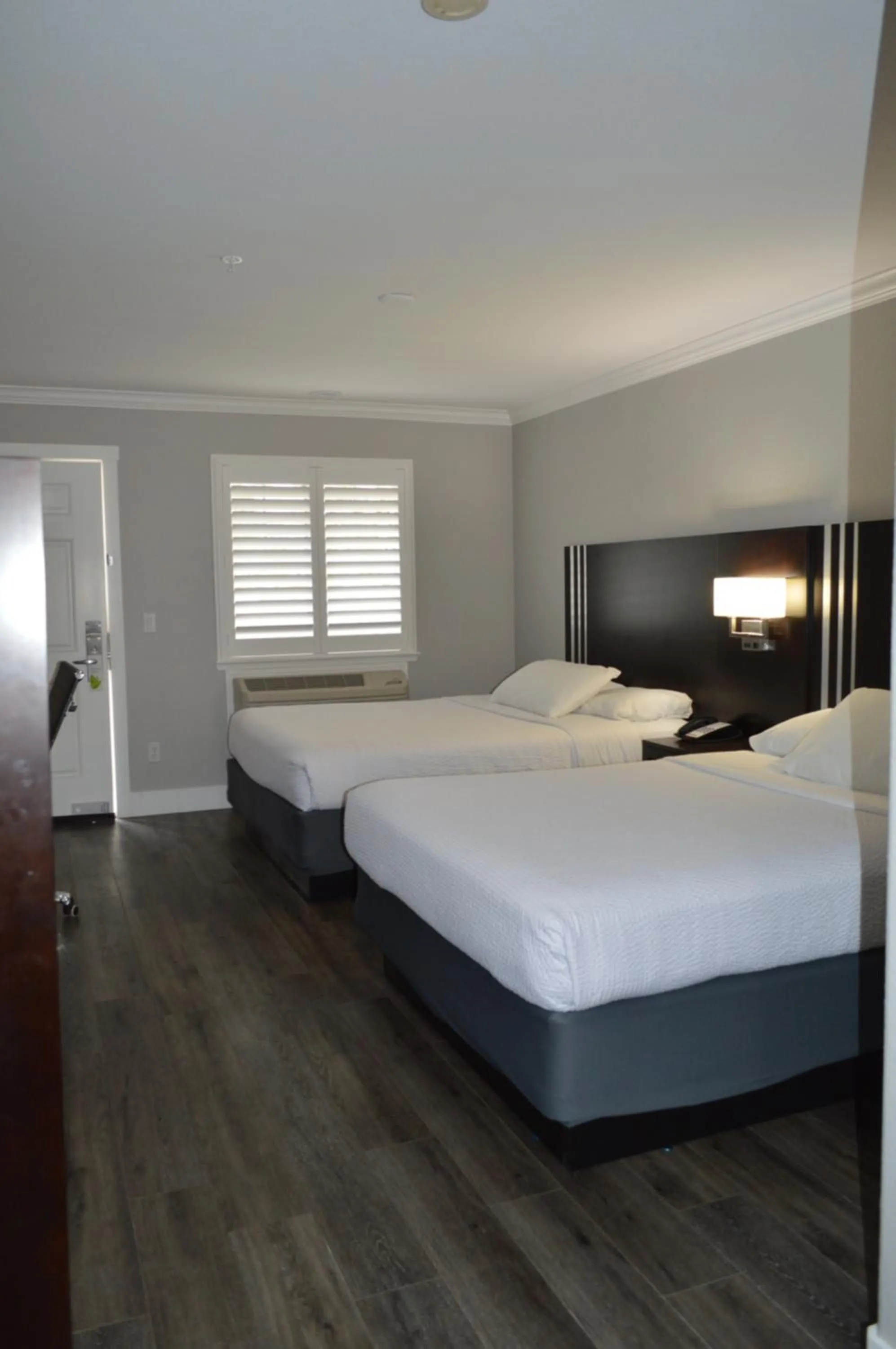 Bed in Fairview Inn & Suites