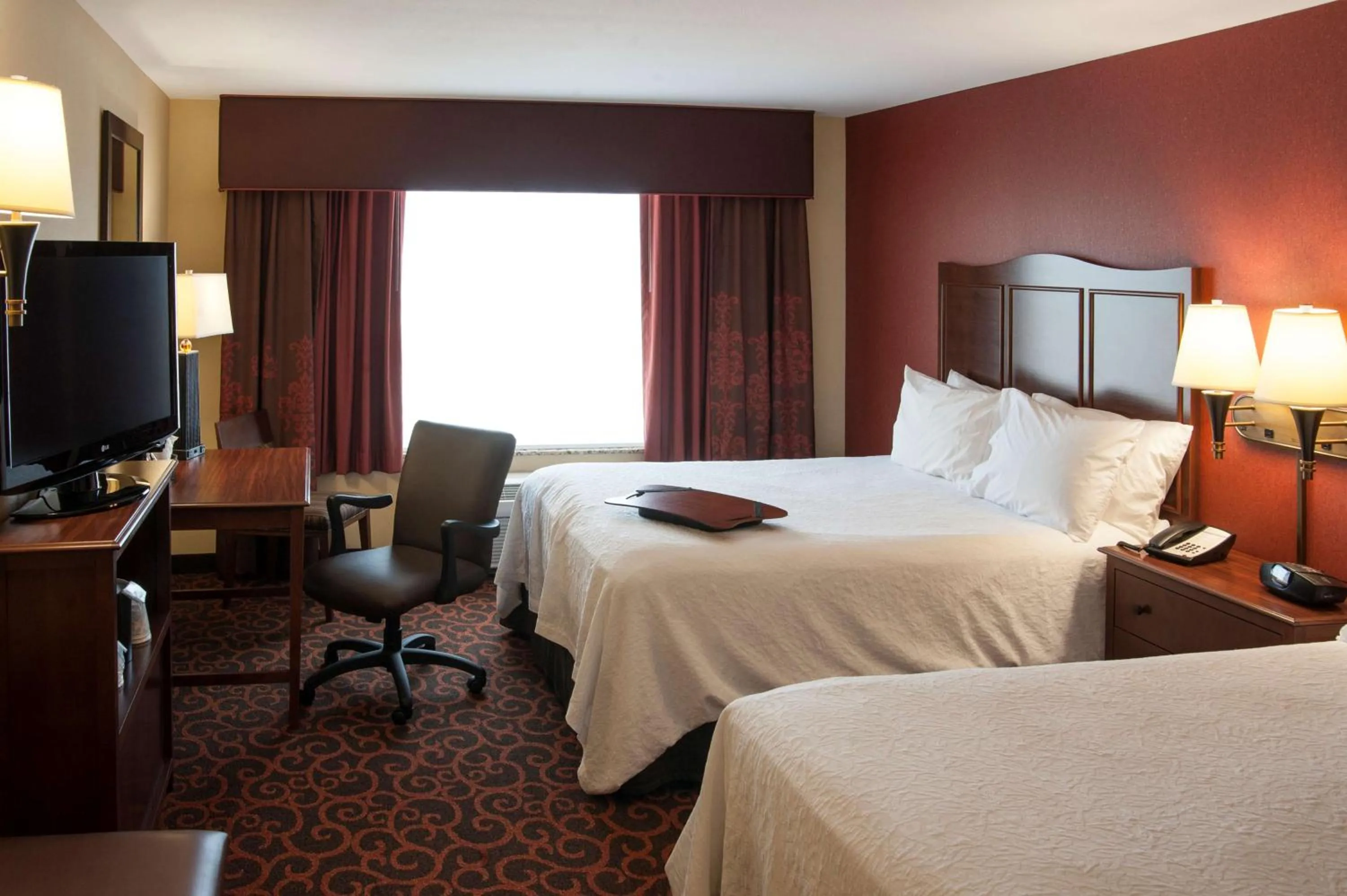 Bed in Hampton Inn & Suites Watertown