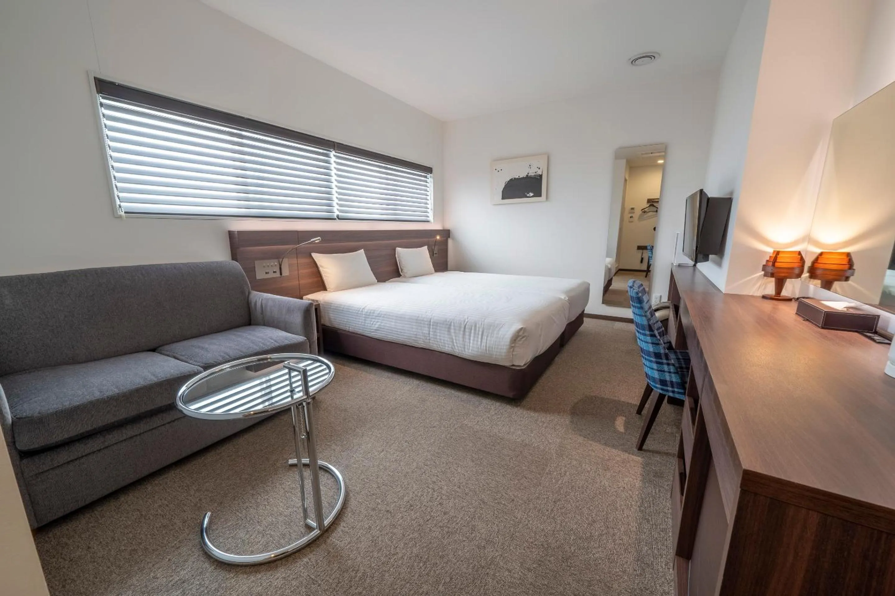 Bed in RESI STAY Jisco Hotel Kyoto Goshonishi