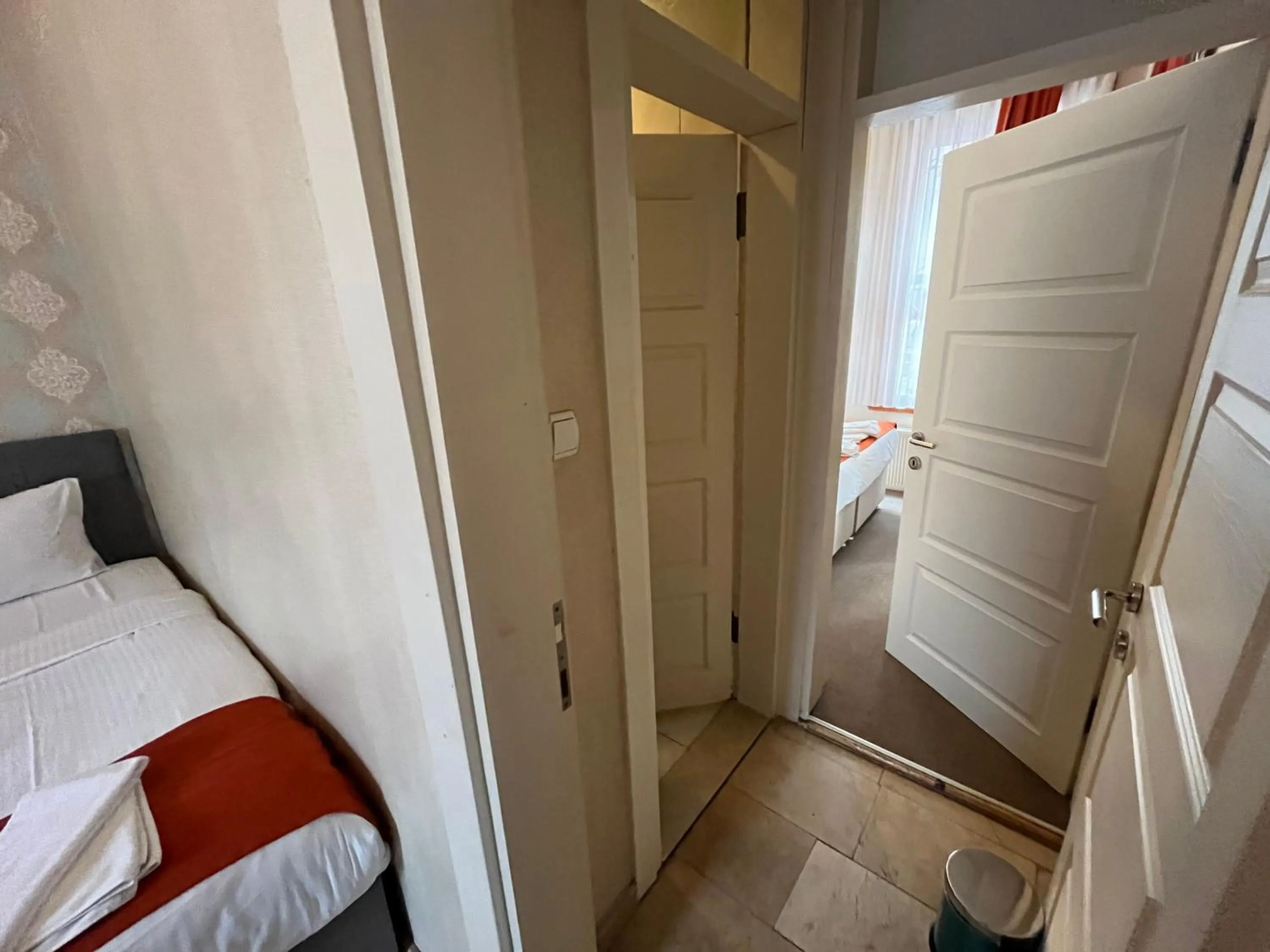 Bed in Le Safran Suite Hotel