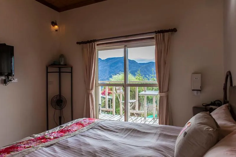 Bed in Shan Shui-Yuan Vege Guest House
