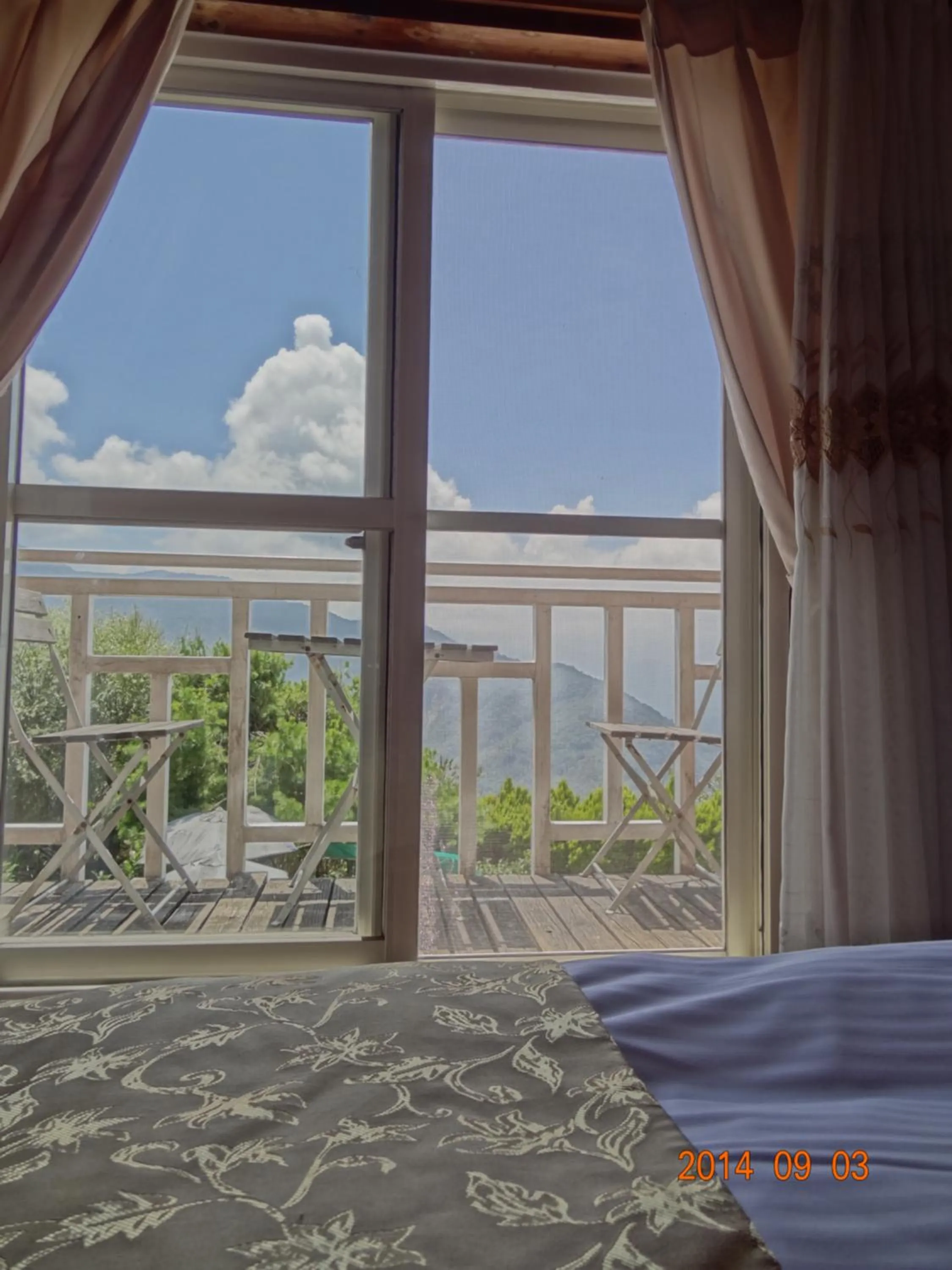 Bed in Shan Shui-Yuan Vege Guest House