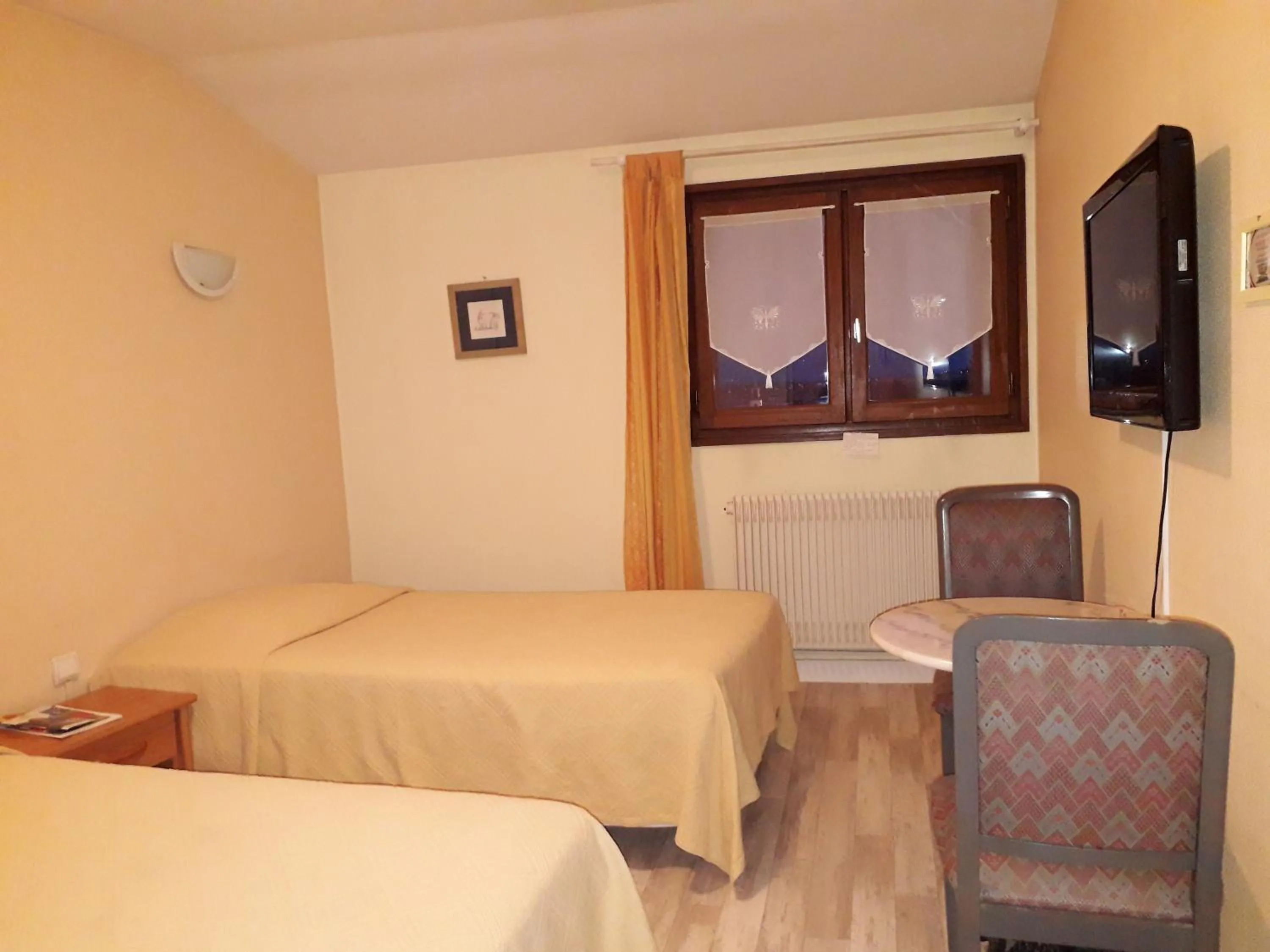 Bed in Hotel Le Beauregard