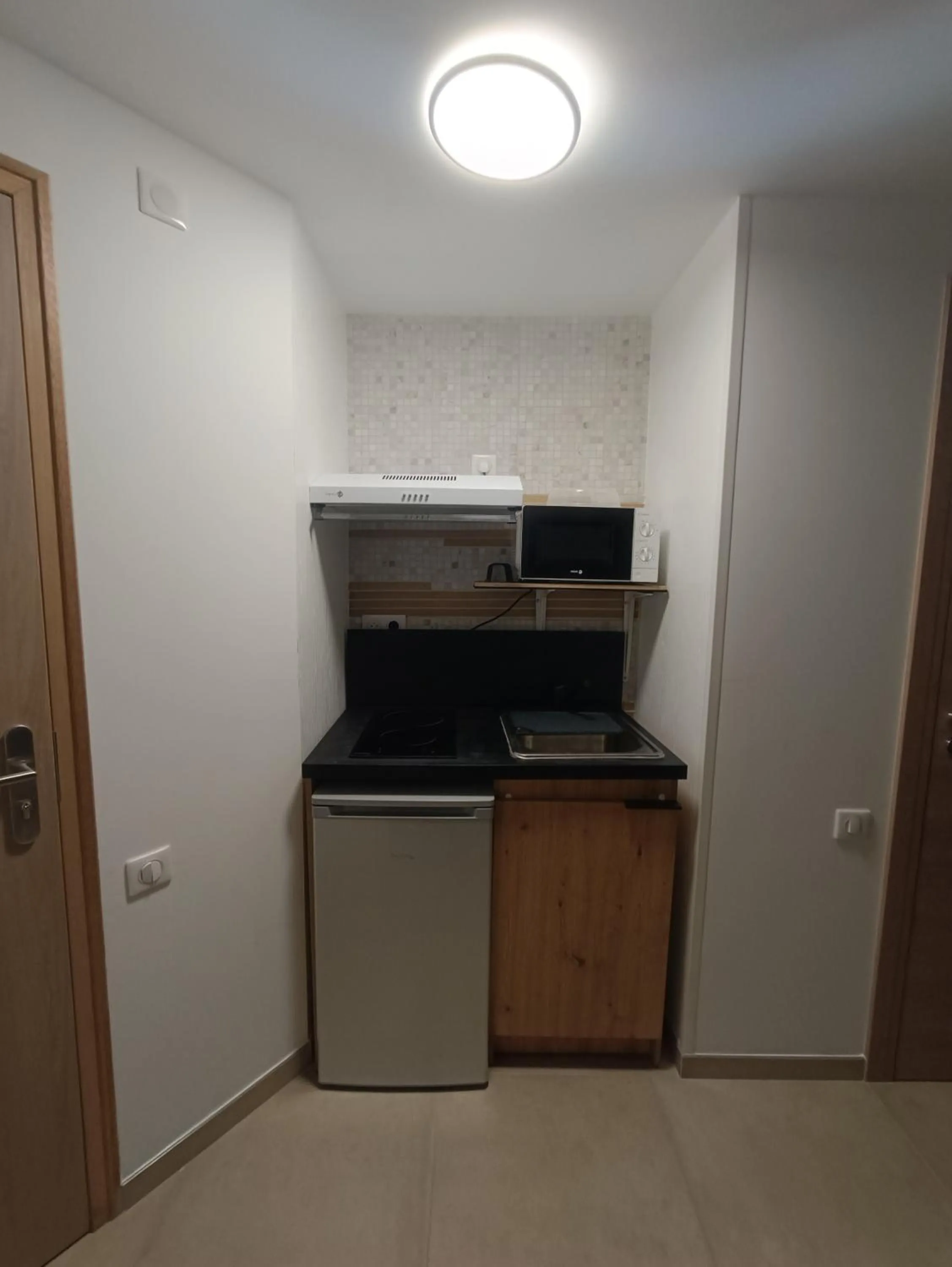 Kitchen or kitchenette in Hotel Le Beauregard