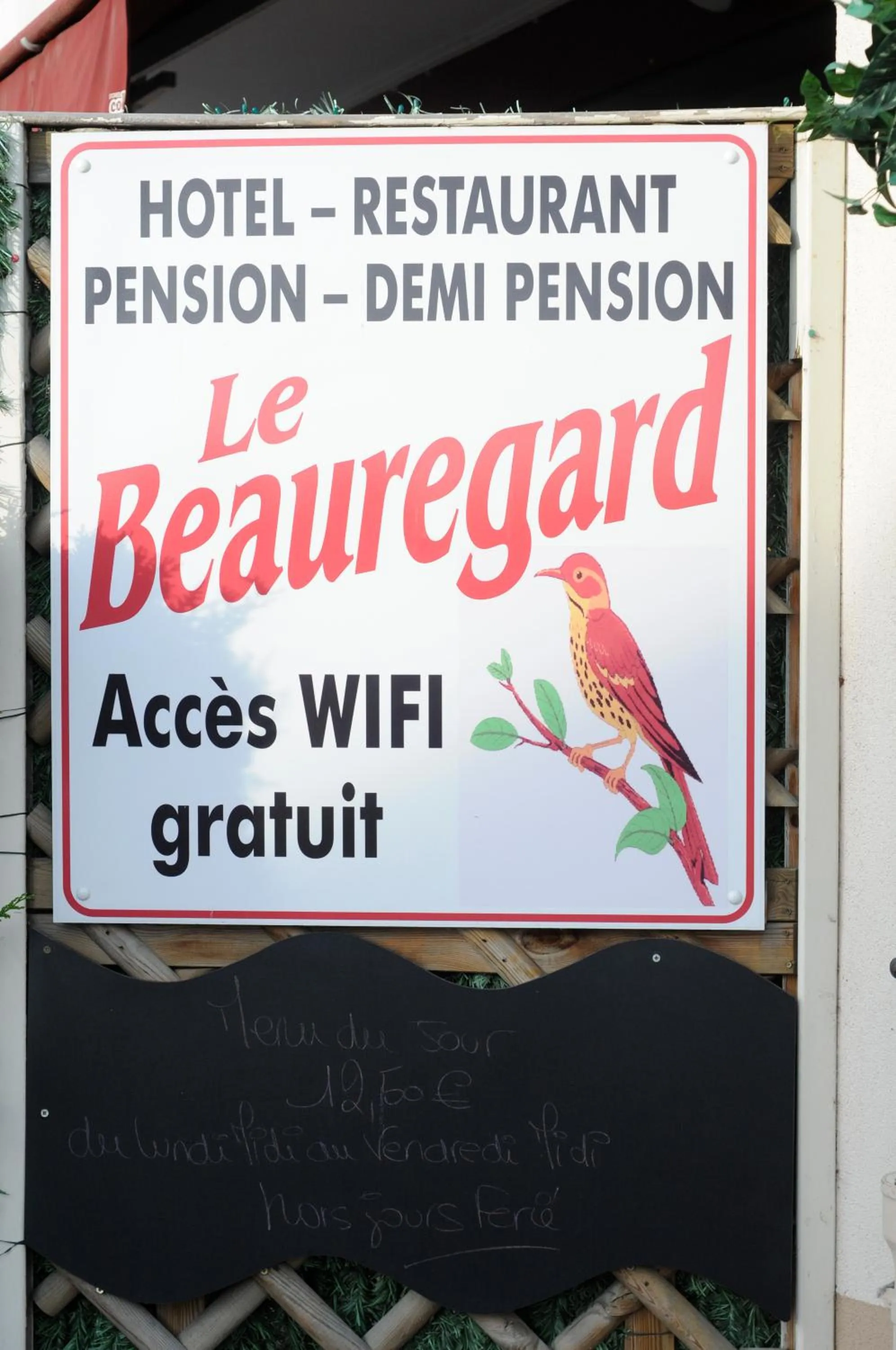 Property logo or sign in Hotel Le Beauregard