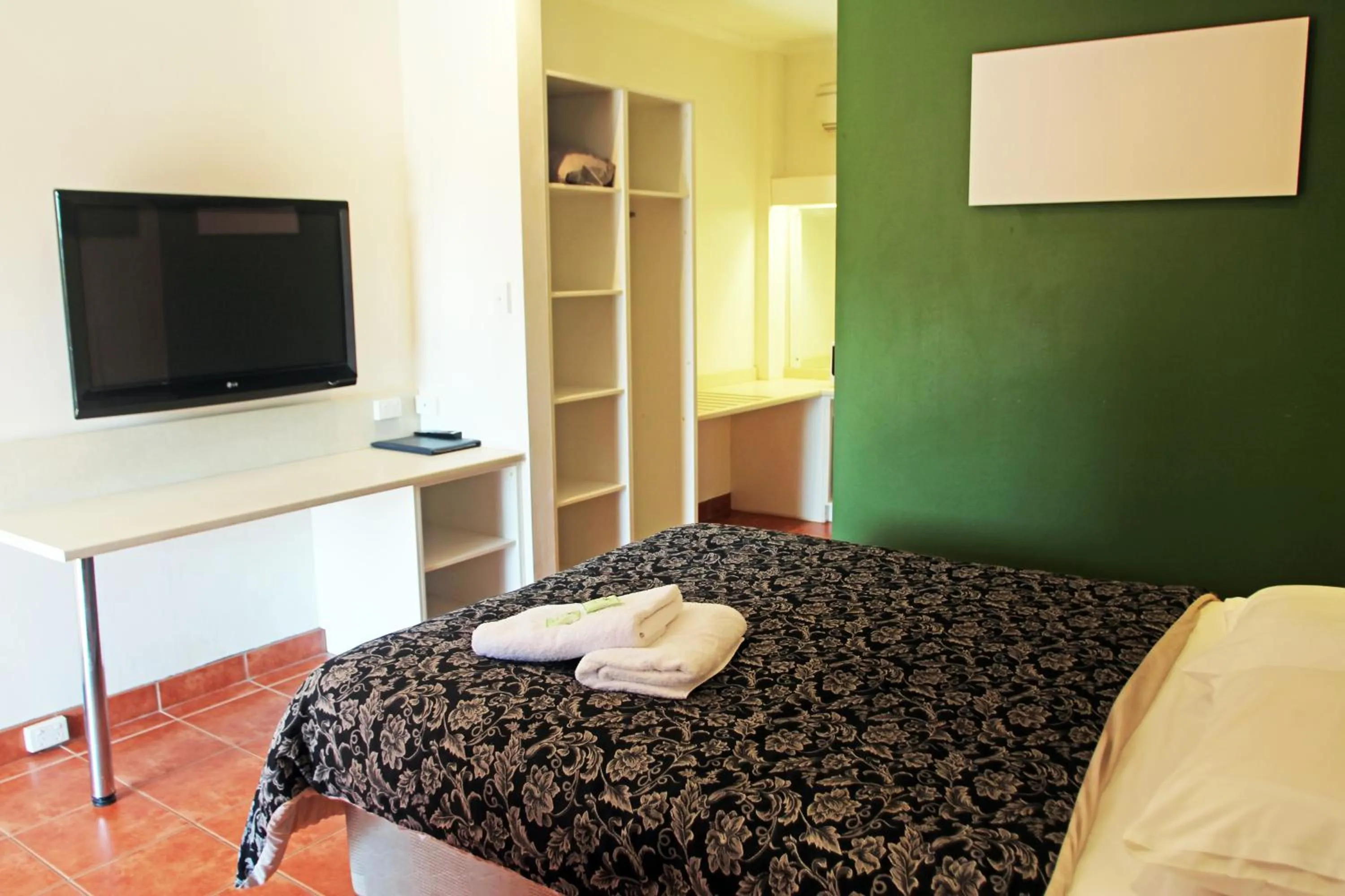 Bedroom, Bed in The Stuart Hotel-Motel